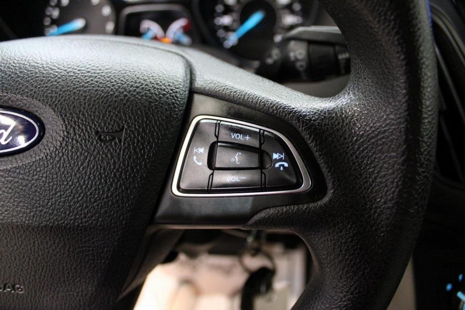 2017 White Gold /Medium Light Stone Ford Focus SE (1FADP3F20HL) with an 2.0L 4-Cylinder DGI Flex Fuel Turbocharged DOHC engine, Automatic transmission, located at 15300 Midway Rd., Addison, TX, 75001, (972) 702-0011, 32.958321, -96.838074 - 2017 Ford Focus SE<br>Now Available at Midway Auto Group Addison, Texas<br><br>Smart, efficient, and comfortable, the 2017 Ford Focus SE is a compact sedan that delivers excellent fuel economy, responsive handling, and modern tech at a budget-friendly price. Whether youre commuting through Addison - Photo#22