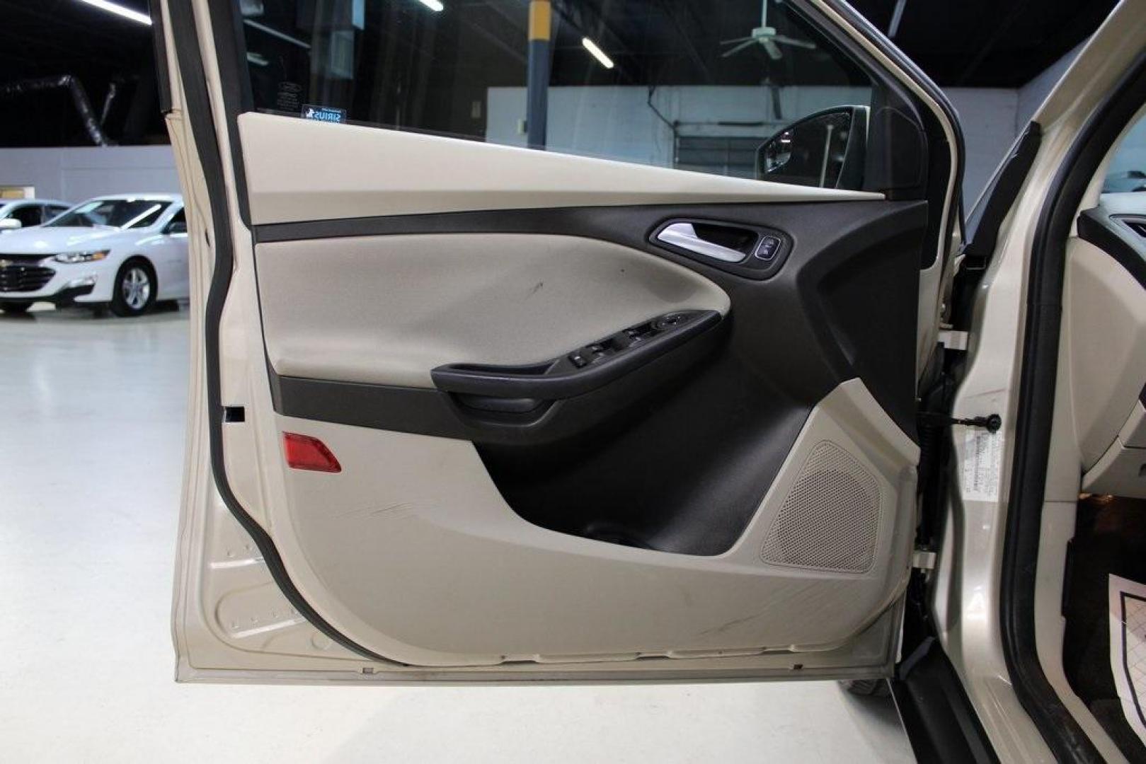 2017 White Gold /Medium Light Stone Ford Focus SE (1FADP3F20HL) with an 2.0L 4-Cylinder DGI Flex Fuel Turbocharged DOHC engine, Automatic transmission, located at 15300 Midway Rd., Addison, TX, 75001, (972) 702-0011, 32.958321, -96.838074 - 2017 Ford Focus SE<br>Now Available at Midway Auto Group Addison, Texas<br><br>Smart, efficient, and comfortable, the 2017 Ford Focus SE is a compact sedan that delivers excellent fuel economy, responsive handling, and modern tech at a budget-friendly price. Whether youre commuting through Addison - Photo#25