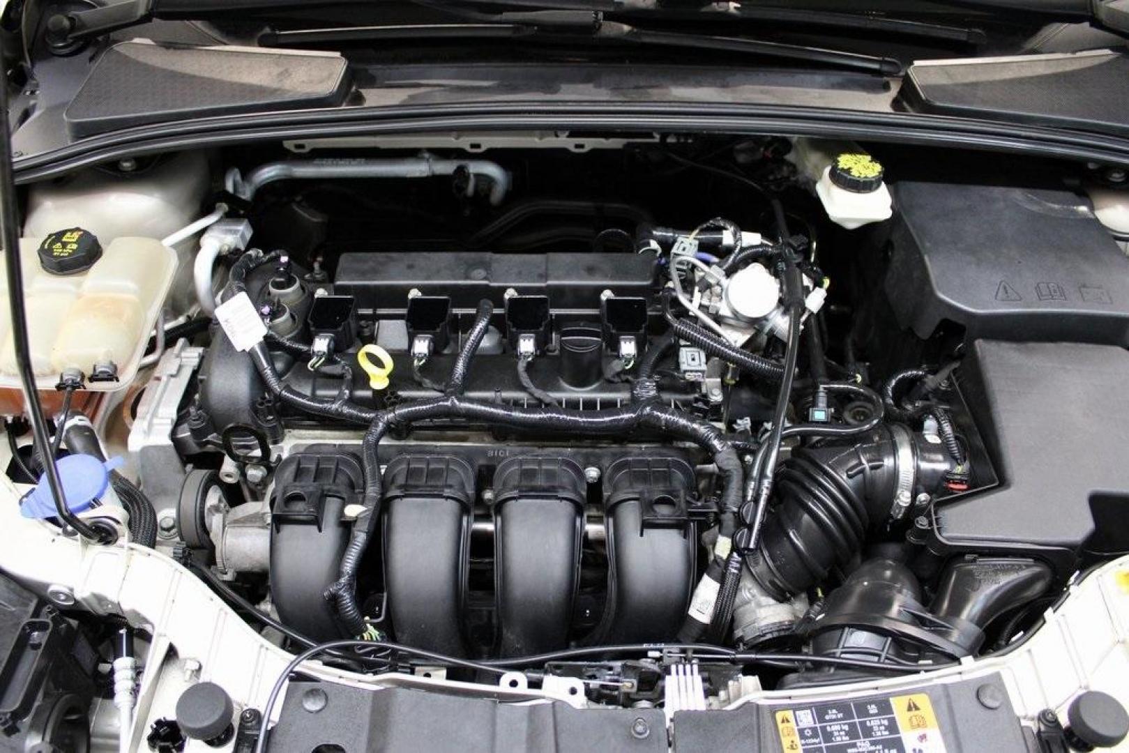 2017 White Gold /Medium Light Stone Ford Focus SE (1FADP3F20HL) with an 2.0L 4-Cylinder DGI Flex Fuel Turbocharged DOHC engine, Automatic transmission, located at 15300 Midway Rd., Addison, TX, 75001, (972) 702-0011, 32.958321, -96.838074 - 2017 Ford Focus SE<br>Now Available at Midway Auto Group Addison, Texas<br><br>Smart, efficient, and comfortable, the 2017 Ford Focus SE is a compact sedan that delivers excellent fuel economy, responsive handling, and modern tech at a budget-friendly price. Whether youre commuting through Addison - Photo#27