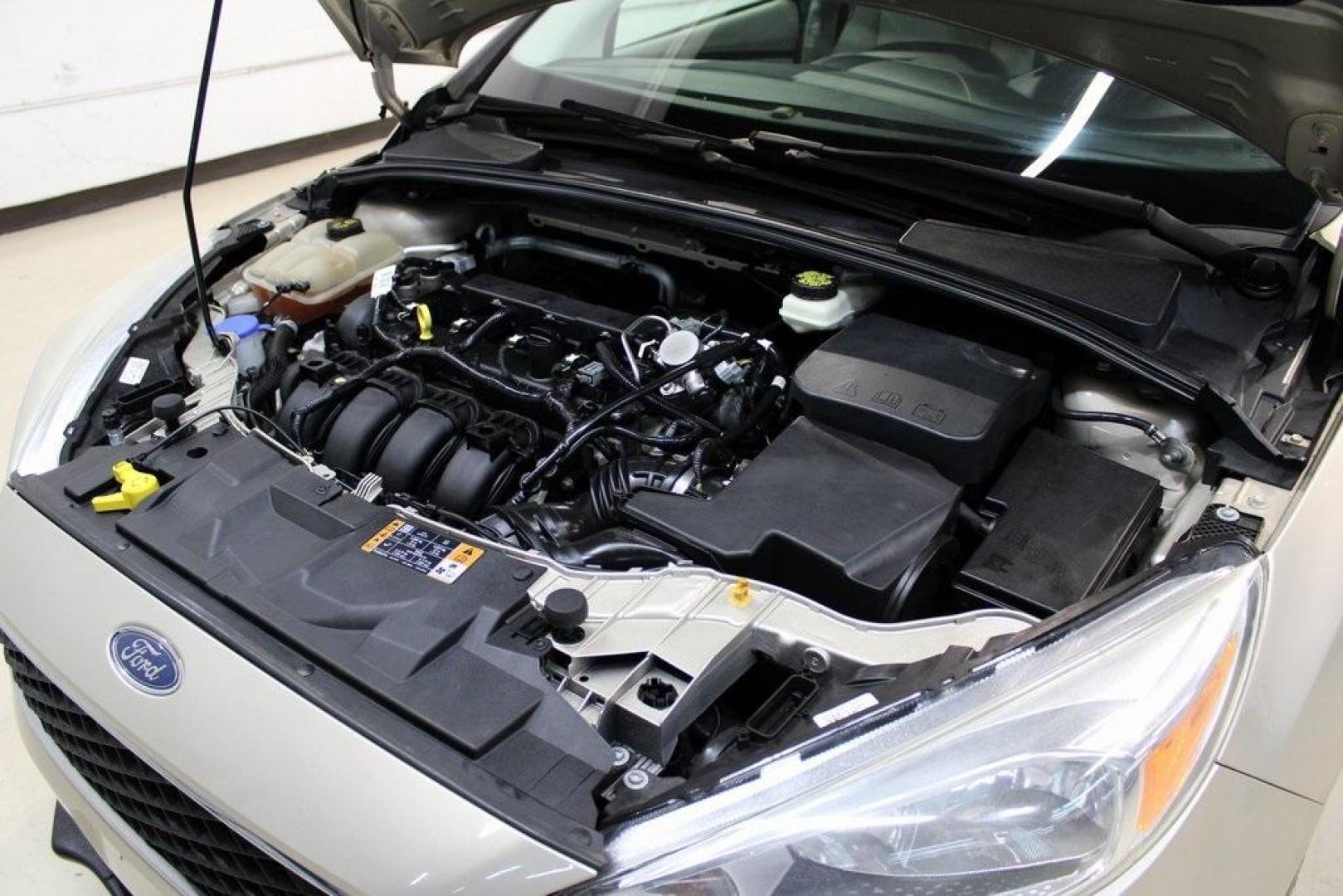 2017 White Gold /Medium Light Stone Ford Focus SE (1FADP3F20HL) with an 2.0L 4-Cylinder DGI Flex Fuel Turbocharged DOHC engine, Automatic transmission, located at 15300 Midway Rd., Addison, TX, 75001, (972) 702-0011, 32.958321, -96.838074 - 2017 Ford Focus SE<br>Now Available at Midway Auto Group Addison, Texas<br><br>Smart, efficient, and comfortable, the 2017 Ford Focus SE is a compact sedan that delivers excellent fuel economy, responsive handling, and modern tech at a budget-friendly price. Whether youre commuting through Addison - Photo#28