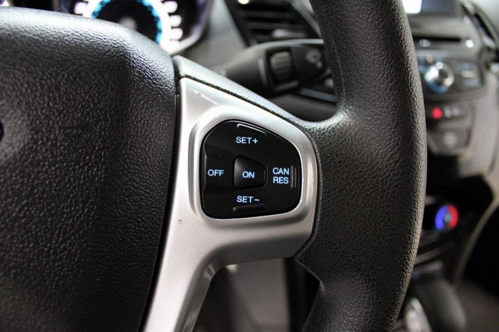 2019 Oxford White /Black Ford Fiesta SE (3FADP4EJ1KM) with an 1.6L I4 Ti-VCT engine, Automatic transmission, located at 15300 Midway Rd., Addison, TX, 75001, (972) 702-0011, 32.958321, -96.838074 - 2019 Ford Fiesta SE Hatchback<br>Now Available at Midway Auto Group Addison, Texas<br><br>Sporty, efficient, and fun to drive, the 2019 Ford Fiesta SE Hatchback delivers big versatility in a compact package. With its hatchback design, nimble handling, and great fuel economy, this Fiesta is perfect - Photo#20