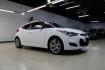 2016 White /Black Hyundai Veloster Base (KMHTC6AD8GU) with an 1.6L I4 DGI DOHC 16V ULEV II 132hp engine, Automatic transmission, located at 15300 Midway Rd., Addison, TX, 75001, (972) 702-0011, 32.958321, -96.838074 - 2016 Hyundai Veloster<br>Now Available at Midway Auto Group Addison, Texas<br><br>Sporty, unique, and fun to drive, the 2016 Hyundai Veloster stands out with its bold design and hatchback versatility. Perfect for drivers who want style, efficiency, and modern tech in one compact package, the Velost - Photo#6