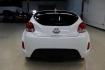2016 White /Black Hyundai Veloster Base (KMHTC6AD8GU) with an 1.6L I4 DGI DOHC 16V ULEV II 132hp engine, Automatic transmission, located at 15300 Midway Rd., Addison, TX, 75001, (972) 702-0011, 32.958321, -96.838074 - 2016 Hyundai Veloster<br>Now Available at Midway Auto Group Addison, Texas<br><br>Sporty, unique, and fun to drive, the 2016 Hyundai Veloster stands out with its bold design and hatchback versatility. Perfect for drivers who want style, efficiency, and modern tech in one compact package, the Velost - Photo#7