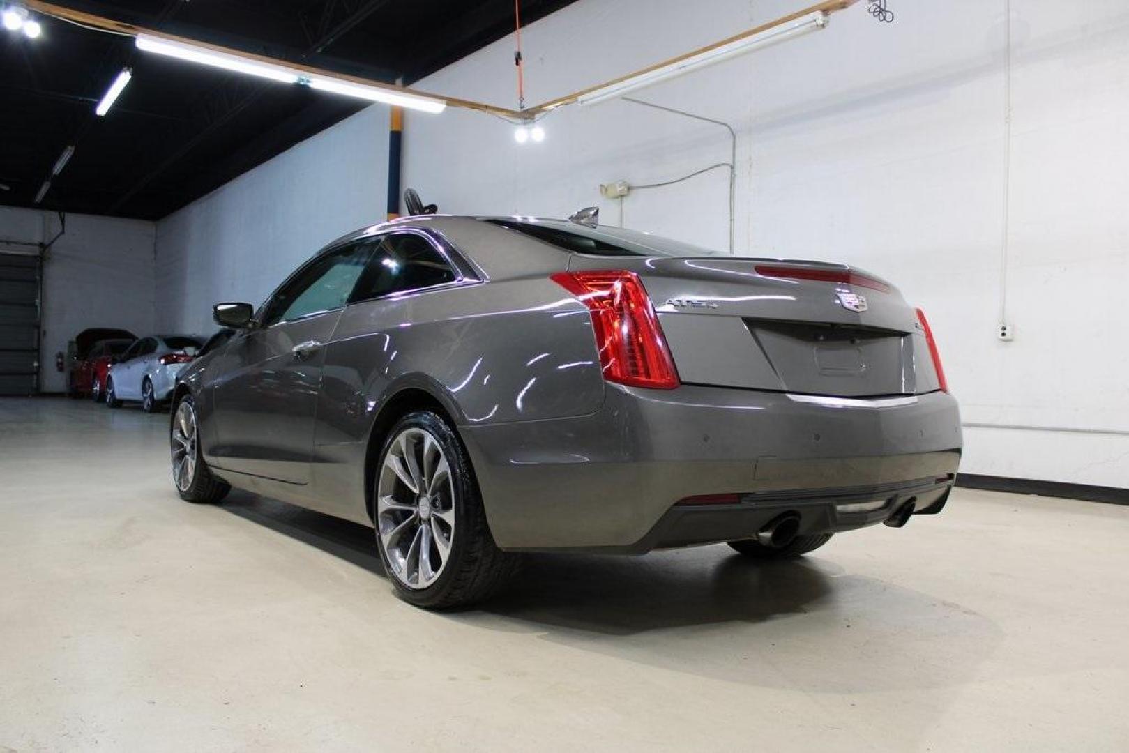 2016 Black Raven /Jet Black With Jet Black Accents Cadillac ATS 2.0L Turbo Performance (1G6AK1RX0G0) with an 2.0L Turbo I4 DI DOHC VVT engine, Automatic transmission, located at 15300 Midway Rd., Addison, TX, 75001, (972) 702-0011, 32.958321, -96.838074 - 2016 Cadillac CTS 2.0T Luxury Collection<br>Now Available at Midway Auto Group Addison, Texas<br><br>Experience refined American luxury and precision performance with the 2016 Cadillac CTS Luxury Collection. With a turbocharged engine, elegant styling, and a feature-rich cabin, this premium sedan s - Photo#4