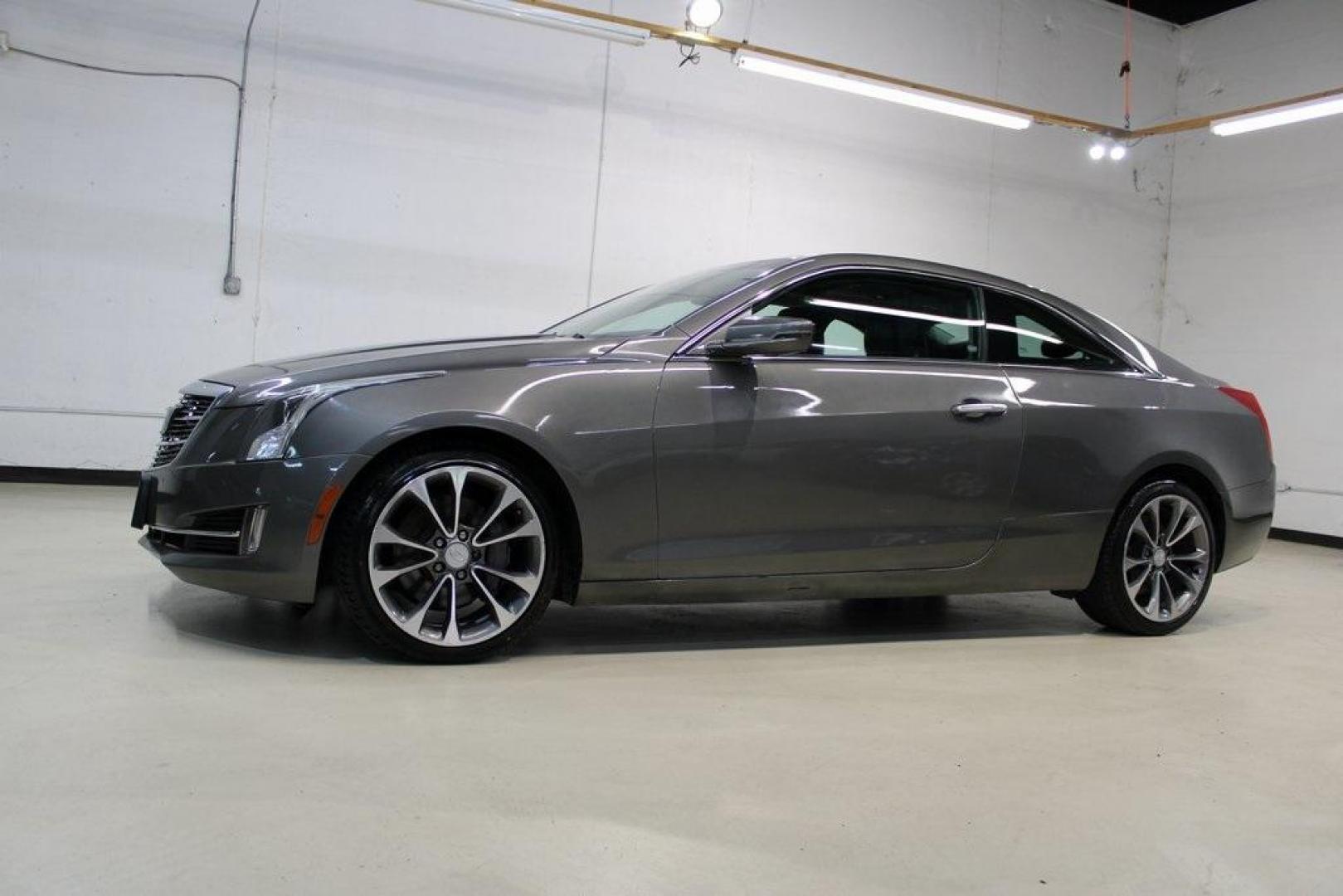 2016 Black Raven /Jet Black With Jet Black Accents Cadillac ATS 2.0L Turbo Performance (1G6AK1RX0G0) with an 2.0L Turbo I4 DI DOHC VVT engine, Automatic transmission, located at 15300 Midway Rd., Addison, TX, 75001, (972) 702-0011, 32.958321, -96.838074 - 2016 Cadillac CTS 2.0T Luxury Collection<br>Now Available at Midway Auto Group Addison, Texas<br><br>Experience refined American luxury and precision performance with the 2016 Cadillac CTS Luxury Collection. With a turbocharged engine, elegant styling, and a feature-rich cabin, this premium sedan s - Photo#5