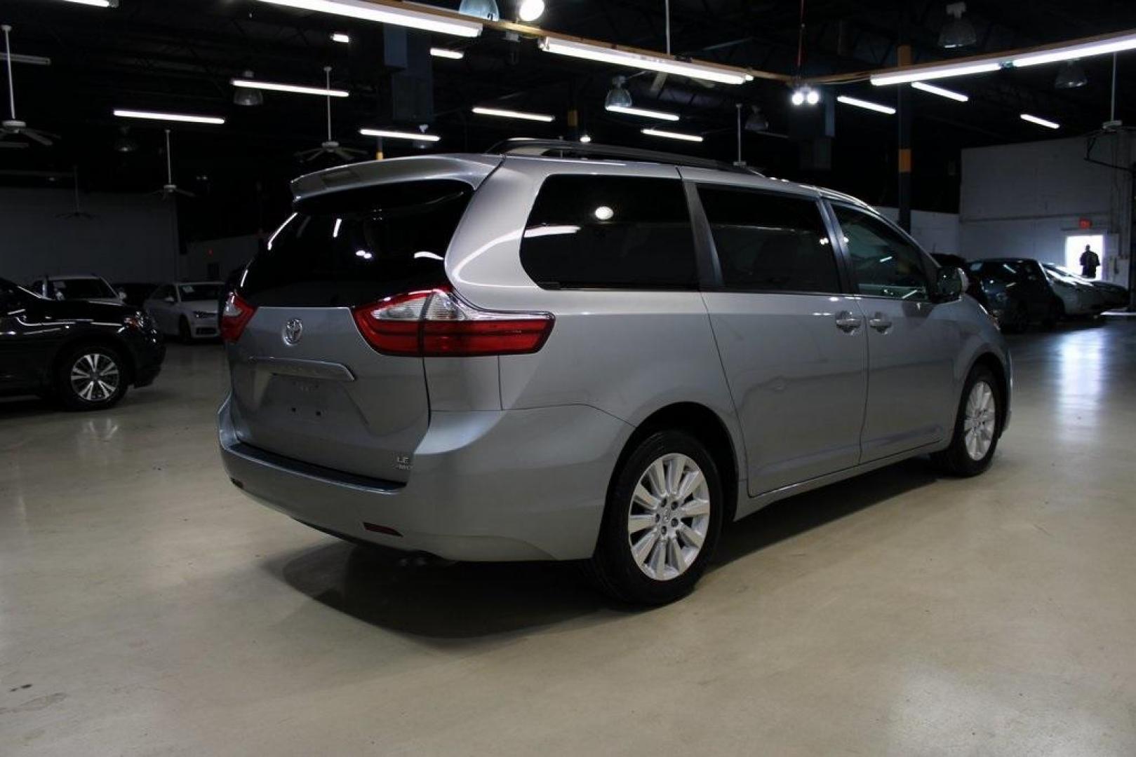 2015 Silver Sky Metallic /Ash Toyota Sienna LE (5TDJK3DC0FS) with an 3.5L V6 SMPI DOHC engine, Automatic transmission, located at 15300 Midway Rd., Addison, TX, 75001, (972) 702-0011, 32.958321, -96.838074 - 2015 Toyota Sienna XLE AWD<br>Now Available at Midway Auto Group Addison, Texas<br><br>Family-focused, feature-rich, and built to lastthe 2015 Toyota Sienna XLE AWD brings together minivan practicality with premium comfort and all-weather confidence. Whether you're navigating DFW traffic or heading - Photo#2
