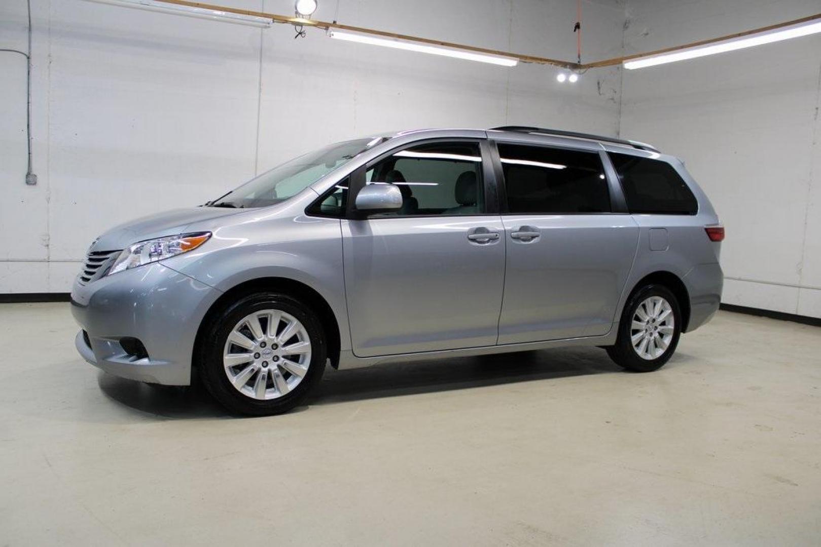 2015 Silver Sky Metallic /Ash Toyota Sienna LE (5TDJK3DC0FS) with an 3.5L V6 SMPI DOHC engine, Automatic transmission, located at 15300 Midway Rd., Addison, TX, 75001, (972) 702-0011, 32.958321, -96.838074 - 2015 Toyota Sienna XLE AWD<br>Now Available at Midway Auto Group Addison, Texas<br><br>Family-focused, feature-rich, and built to lastthe 2015 Toyota Sienna XLE AWD brings together minivan practicality with premium comfort and all-weather confidence. Whether you're navigating DFW traffic or heading - Photo#4