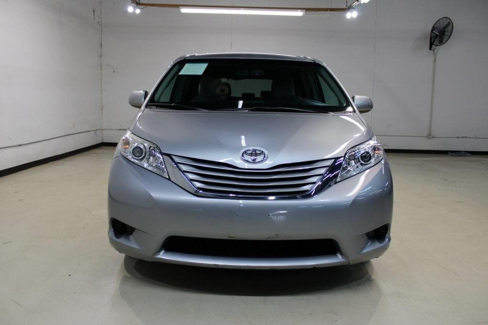 2015 Silver Sky Metallic /Ash Toyota Sienna LE (5TDJK3DC0FS) with an 3.5L V6 SMPI DOHC engine, Automatic transmission, located at 15300 Midway Rd., Addison, TX, 75001, (972) 702-0011, 32.958321, -96.838074 - 2015 Toyota Sienna XLE AWD<br>Now Available at Midway Auto Group Addison, Texas<br><br>Family-focused, feature-rich, and built to lastthe 2015 Toyota Sienna XLE AWD brings together minivan practicality with premium comfort and all-weather confidence. Whether you're navigating DFW traffic or heading - Photo#5