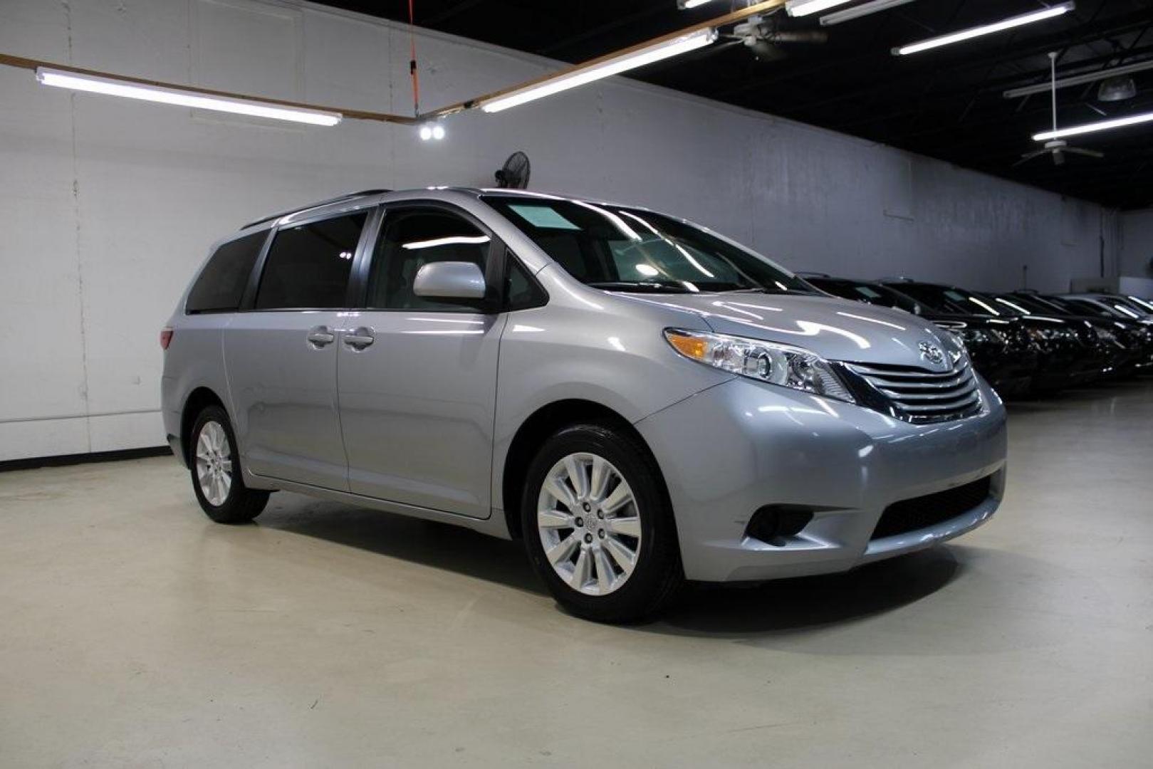 2015 Silver Sky Metallic /Ash Toyota Sienna LE (5TDJK3DC0FS) with an 3.5L V6 SMPI DOHC engine, Automatic transmission, located at 15300 Midway Rd., Addison, TX, 75001, (972) 702-0011, 32.958321, -96.838074 - 2015 Toyota Sienna XLE AWD<br>Now Available at Midway Auto Group Addison, Texas<br><br>Family-focused, feature-rich, and built to lastthe 2015 Toyota Sienna XLE AWD brings together minivan practicality with premium comfort and all-weather confidence. Whether you're navigating DFW traffic or heading - Photo#6