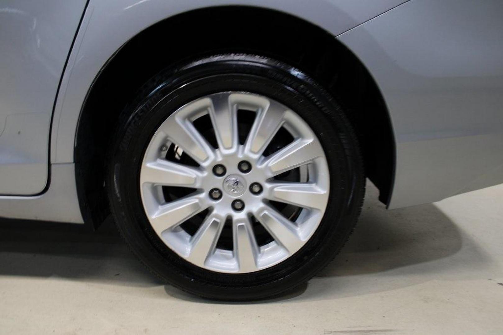2015 Silver Sky Metallic /Ash Toyota Sienna LE (5TDJK3DC0FS) with an 3.5L V6 SMPI DOHC engine, Automatic transmission, located at 15300 Midway Rd., Addison, TX, 75001, (972) 702-0011, 32.958321, -96.838074 - 2015 Toyota Sienna XLE AWD<br>Now Available at Midway Auto Group Addison, Texas<br><br>Family-focused, feature-rich, and built to lastthe 2015 Toyota Sienna XLE AWD brings together minivan practicality with premium comfort and all-weather confidence. Whether you're navigating DFW traffic or heading - Photo#9