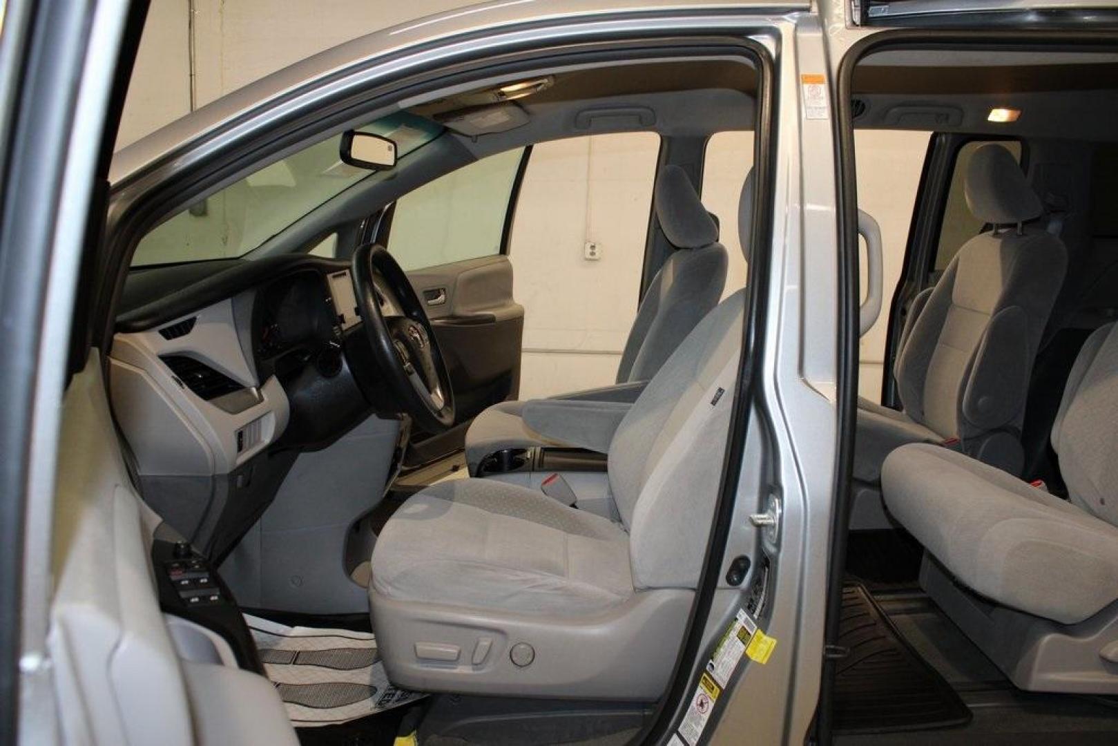 2015 Silver Sky Metallic /Ash Toyota Sienna LE (5TDJK3DC0FS) with an 3.5L V6 SMPI DOHC engine, Automatic transmission, located at 15300 Midway Rd., Addison, TX, 75001, (972) 702-0011, 32.958321, -96.838074 - 2015 Toyota Sienna XLE AWD<br>Now Available at Midway Auto Group Addison, Texas<br><br>Family-focused, feature-rich, and built to lastthe 2015 Toyota Sienna XLE AWD brings together minivan practicality with premium comfort and all-weather confidence. Whether you're navigating DFW traffic or heading - Photo#13