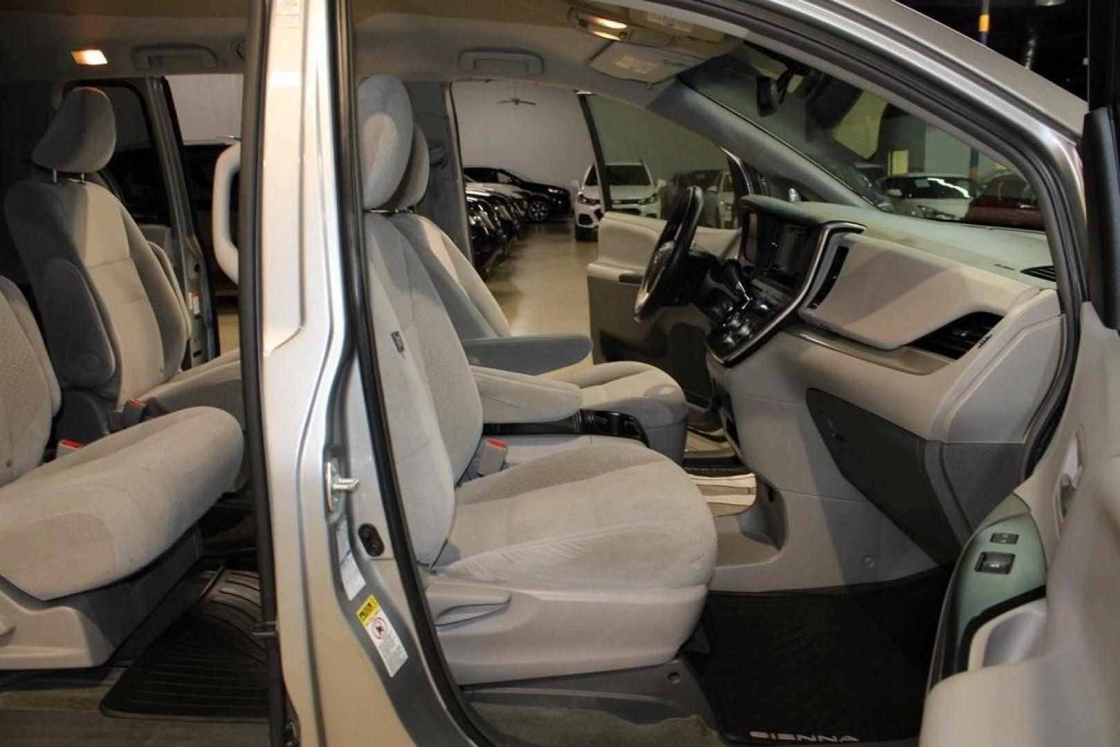 2015 Silver Sky Metallic /Ash Toyota Sienna LE (5TDJK3DC0FS) with an 3.5L V6 SMPI DOHC engine, Automatic transmission, located at 15300 Midway Rd., Addison, TX, 75001, (972) 702-0011, 32.958321, -96.838074 - 2015 Toyota Sienna XLE AWD<br>Now Available at Midway Auto Group Addison, Texas<br><br>Family-focused, feature-rich, and built to lastthe 2015 Toyota Sienna XLE AWD brings together minivan practicality with premium comfort and all-weather confidence. Whether you're navigating DFW traffic or heading - Photo#14