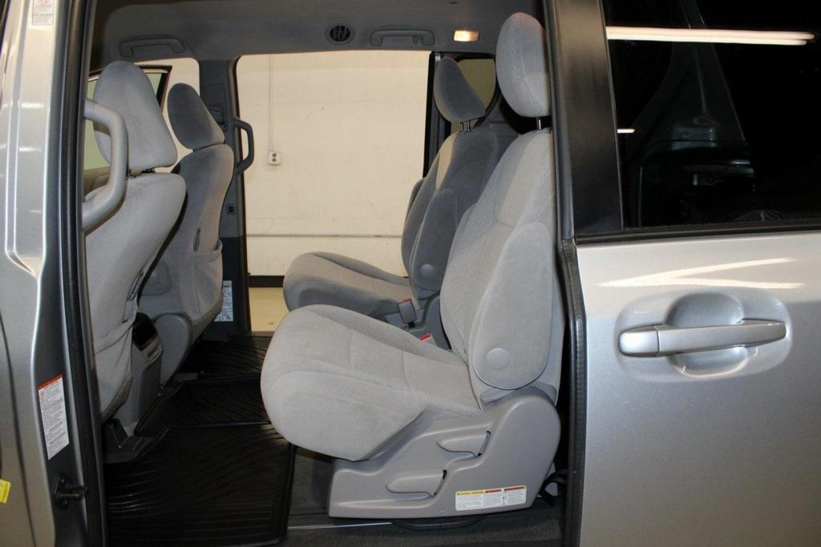 2015 Silver Sky Metallic /Ash Toyota Sienna LE (5TDJK3DC0FS) with an 3.5L V6 SMPI DOHC engine, Automatic transmission, located at 15300 Midway Rd., Addison, TX, 75001, (972) 702-0011, 32.958321, -96.838074 - 2015 Toyota Sienna XLE AWD<br>Now Available at Midway Auto Group Addison, Texas<br><br>Family-focused, feature-rich, and built to lastthe 2015 Toyota Sienna XLE AWD brings together minivan practicality with premium comfort and all-weather confidence. Whether you're navigating DFW traffic or heading - Photo#16