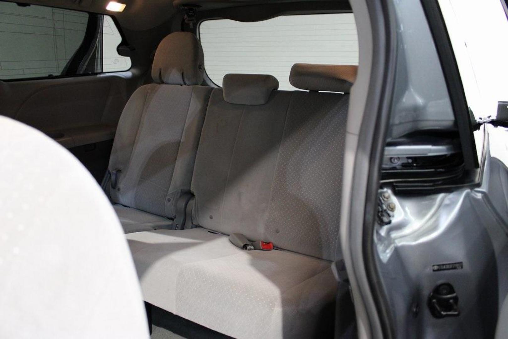 2015 Silver Sky Metallic /Ash Toyota Sienna LE (5TDJK3DC0FS) with an 3.5L V6 SMPI DOHC engine, Automatic transmission, located at 15300 Midway Rd., Addison, TX, 75001, (972) 702-0011, 32.958321, -96.838074 - 2015 Toyota Sienna XLE AWD<br>Now Available at Midway Auto Group Addison, Texas<br><br>Family-focused, feature-rich, and built to lastthe 2015 Toyota Sienna XLE AWD brings together minivan practicality with premium comfort and all-weather confidence. Whether you're navigating DFW traffic or heading - Photo#18