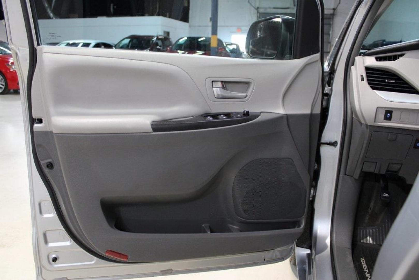 2015 Silver Sky Metallic /Ash Toyota Sienna LE (5TDJK3DC0FS) with an 3.5L V6 SMPI DOHC engine, Automatic transmission, located at 15300 Midway Rd., Addison, TX, 75001, (972) 702-0011, 32.958321, -96.838074 - 2015 Toyota Sienna XLE AWD<br>Now Available at Midway Auto Group Addison, Texas<br><br>Family-focused, feature-rich, and built to lastthe 2015 Toyota Sienna XLE AWD brings together minivan practicality with premium comfort and all-weather confidence. Whether you're navigating DFW traffic or heading - Photo#27