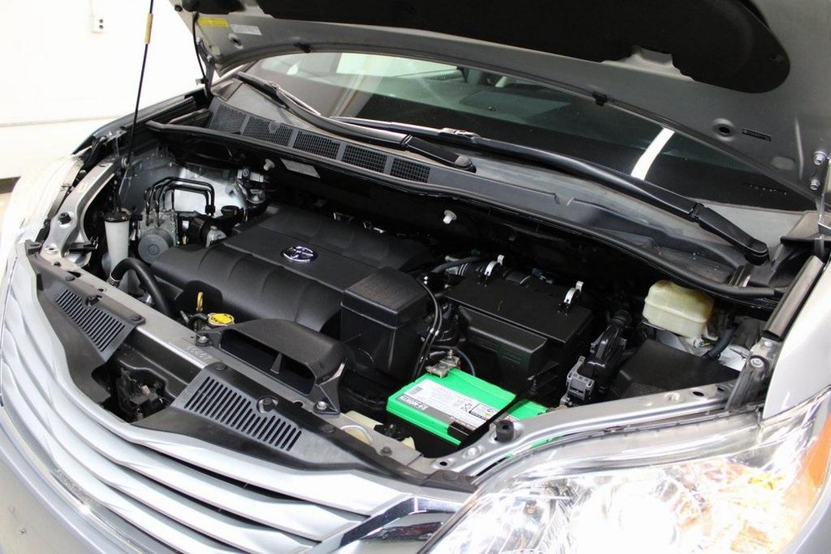 2015 Silver Sky Metallic /Ash Toyota Sienna LE (5TDJK3DC0FS) with an 3.5L V6 SMPI DOHC engine, Automatic transmission, located at 15300 Midway Rd., Addison, TX, 75001, (972) 702-0011, 32.958321, -96.838074 - 2015 Toyota Sienna XLE AWD<br>Now Available at Midway Auto Group Addison, Texas<br><br>Family-focused, feature-rich, and built to lastthe 2015 Toyota Sienna XLE AWD brings together minivan practicality with premium comfort and all-weather confidence. Whether you're navigating DFW traffic or heading - Photo#30