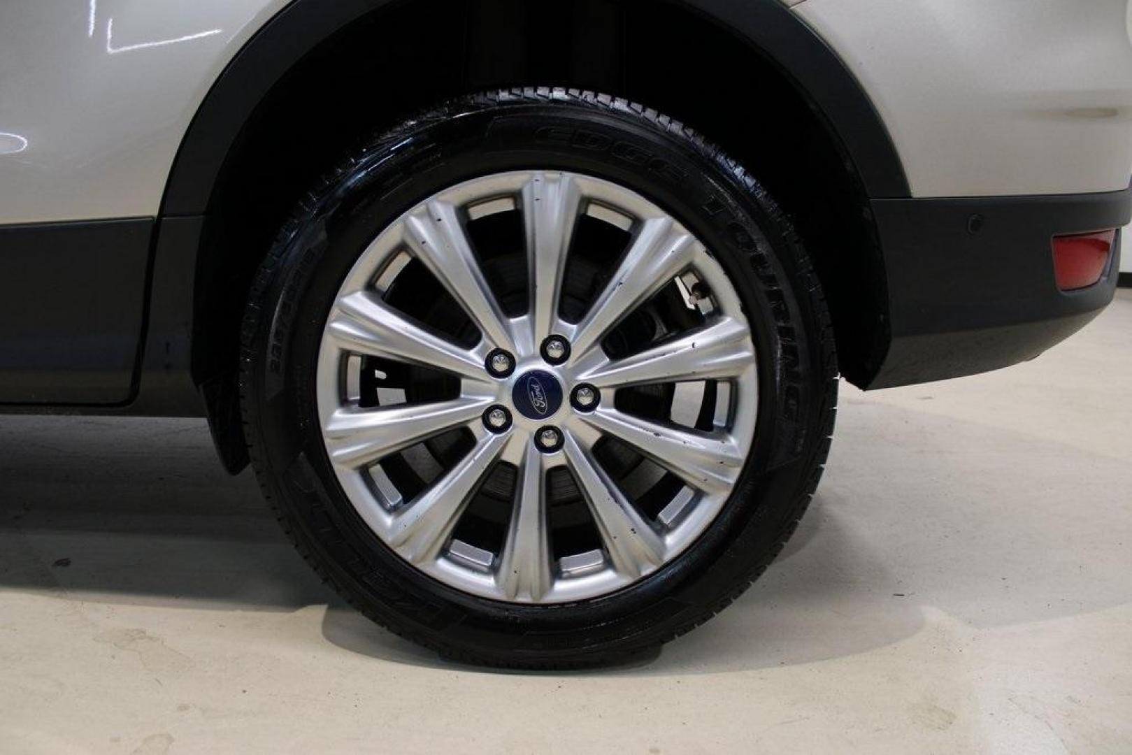 2018 White Gold /Medium Light Stone Ford Escape Titanium (1FMCU0J90JU) with an EcoBoost 2.0L I4 GTDi DOHC Turbocharged VCT engine, Automatic transmission, located at 15300 Midway Rd., Addison, TX, 75001, (972) 702-0011, 32.958321, -96.838074 - Photo#9