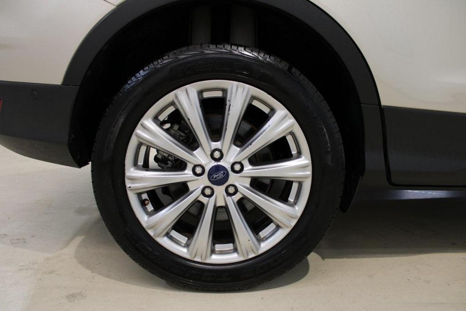 2018 White Gold /Medium Light Stone Ford Escape Titanium (1FMCU0J90JU) with an EcoBoost 2.0L I4 GTDi DOHC Turbocharged VCT engine, Automatic transmission, located at 15300 Midway Rd., Addison, TX, 75001, (972) 702-0011, 32.958321, -96.838074 - Photo#10