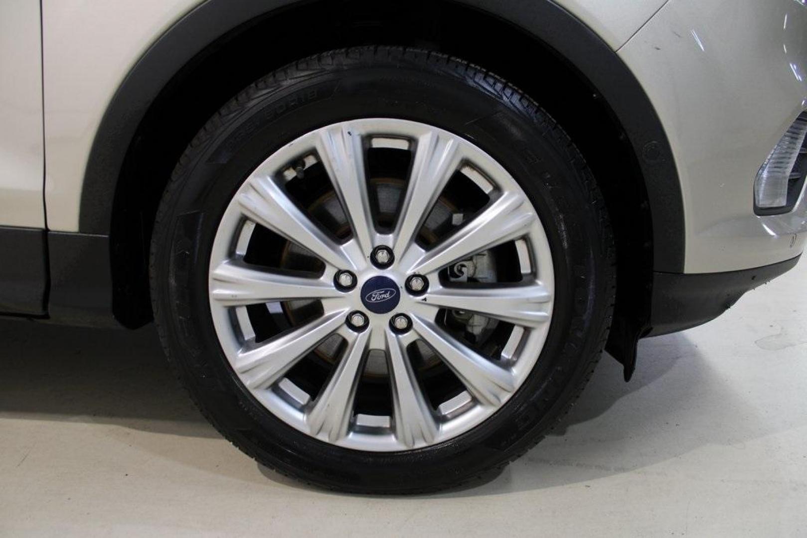 2018 White Gold /Medium Light Stone Ford Escape Titanium (1FMCU0J90JU) with an EcoBoost 2.0L I4 GTDi DOHC Turbocharged VCT engine, Automatic transmission, located at 15300 Midway Rd., Addison, TX, 75001, (972) 702-0011, 32.958321, -96.838074 - Photo#11