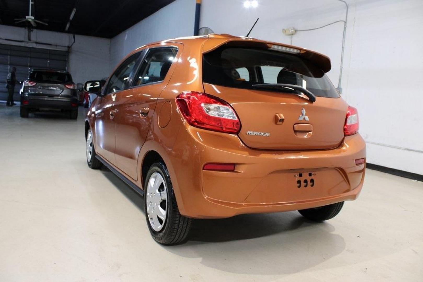 2020 Sunrise Orange Metallic /Black Mitsubishi Mirage ES (ML32A3HJ4LH) with an 1.2L 3-Cylinder DOHC MIVEC engine, CVT transmission, located at 15300 Midway Rd., Addison, TX, 75001, (972) 702-0011, 32.958321, -96.838074 - 2020 Mitsubishi Mirage ES<br>Now Available at Midway Auto Group Addison, Texas<br><br>Efficient, easy to maneuver, and surprisingly roomy, the 2020 Mitsubishi Mirage ES is a practical subcompact hatchback perfect for urban driving or budget-conscious commuters. With its impressive fuel economy and - Photo#1