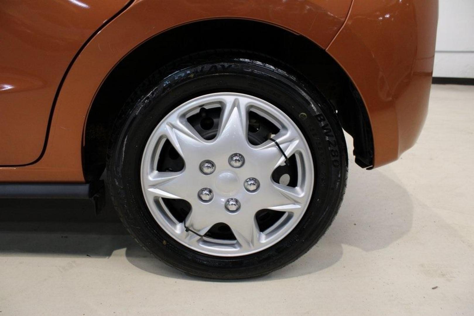2020 Sunrise Orange Metallic /Black Mitsubishi Mirage ES (ML32A3HJ4LH) with an 1.2L 3-Cylinder DOHC MIVEC engine, CVT transmission, located at 15300 Midway Rd., Addison, TX, 75001, (972) 702-0011, 32.958321, -96.838074 - 2020 Mitsubishi Mirage ES<br>Now Available at Midway Auto Group Addison, Texas<br><br>Efficient, easy to maneuver, and surprisingly roomy, the 2020 Mitsubishi Mirage ES is a practical subcompact hatchback perfect for urban driving or budget-conscious commuters. With its impressive fuel economy and - Photo#6