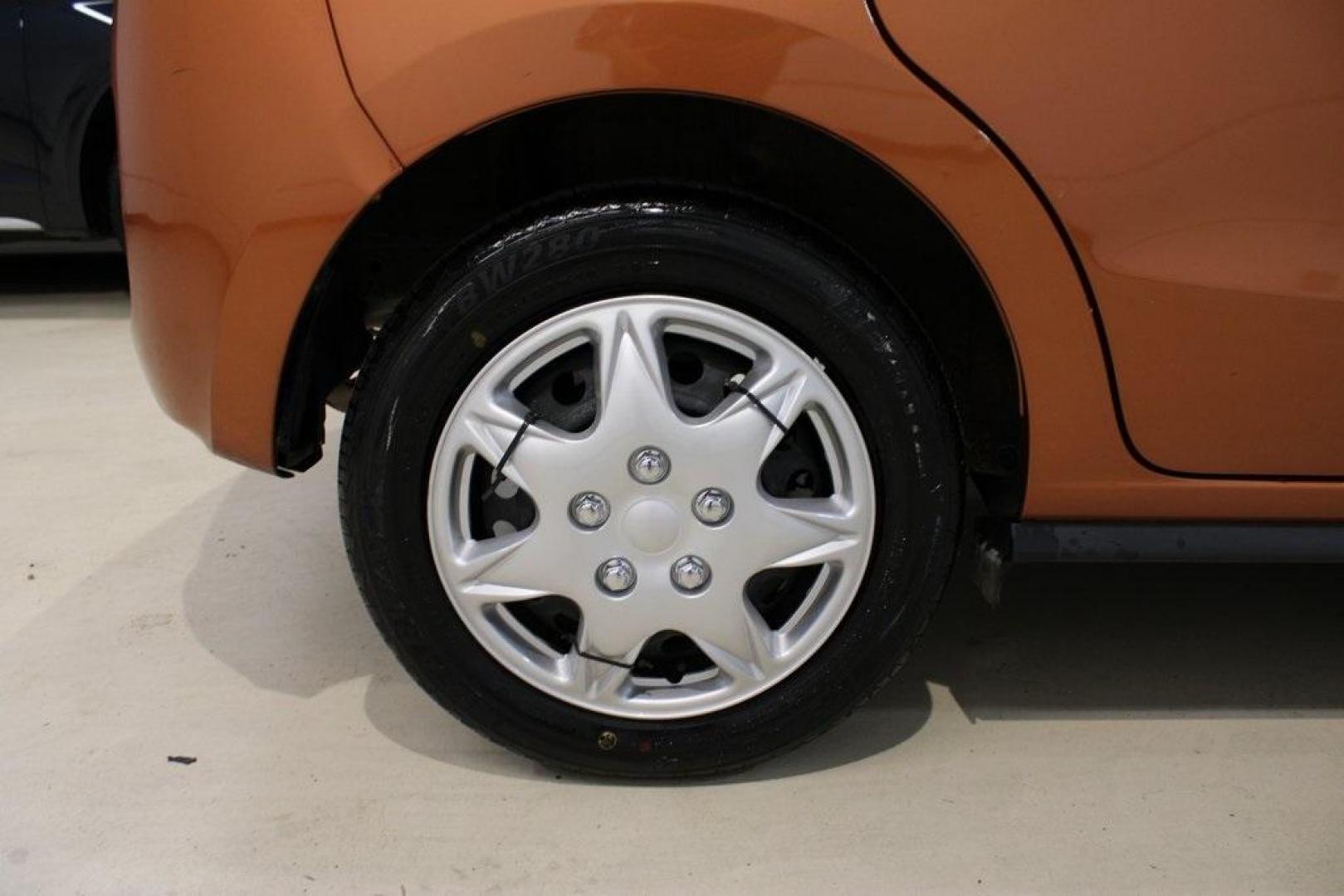 2020 Sunrise Orange Metallic /Black Mitsubishi Mirage ES (ML32A3HJ4LH) with an 1.2L 3-Cylinder DOHC MIVEC engine, CVT transmission, located at 15300 Midway Rd., Addison, TX, 75001, (972) 702-0011, 32.958321, -96.838074 - 2020 Mitsubishi Mirage ES<br>Now Available at Midway Auto Group Addison, Texas<br><br>Efficient, easy to maneuver, and surprisingly roomy, the 2020 Mitsubishi Mirage ES is a practical subcompact hatchback perfect for urban driving or budget-conscious commuters. With its impressive fuel economy and - Photo#7