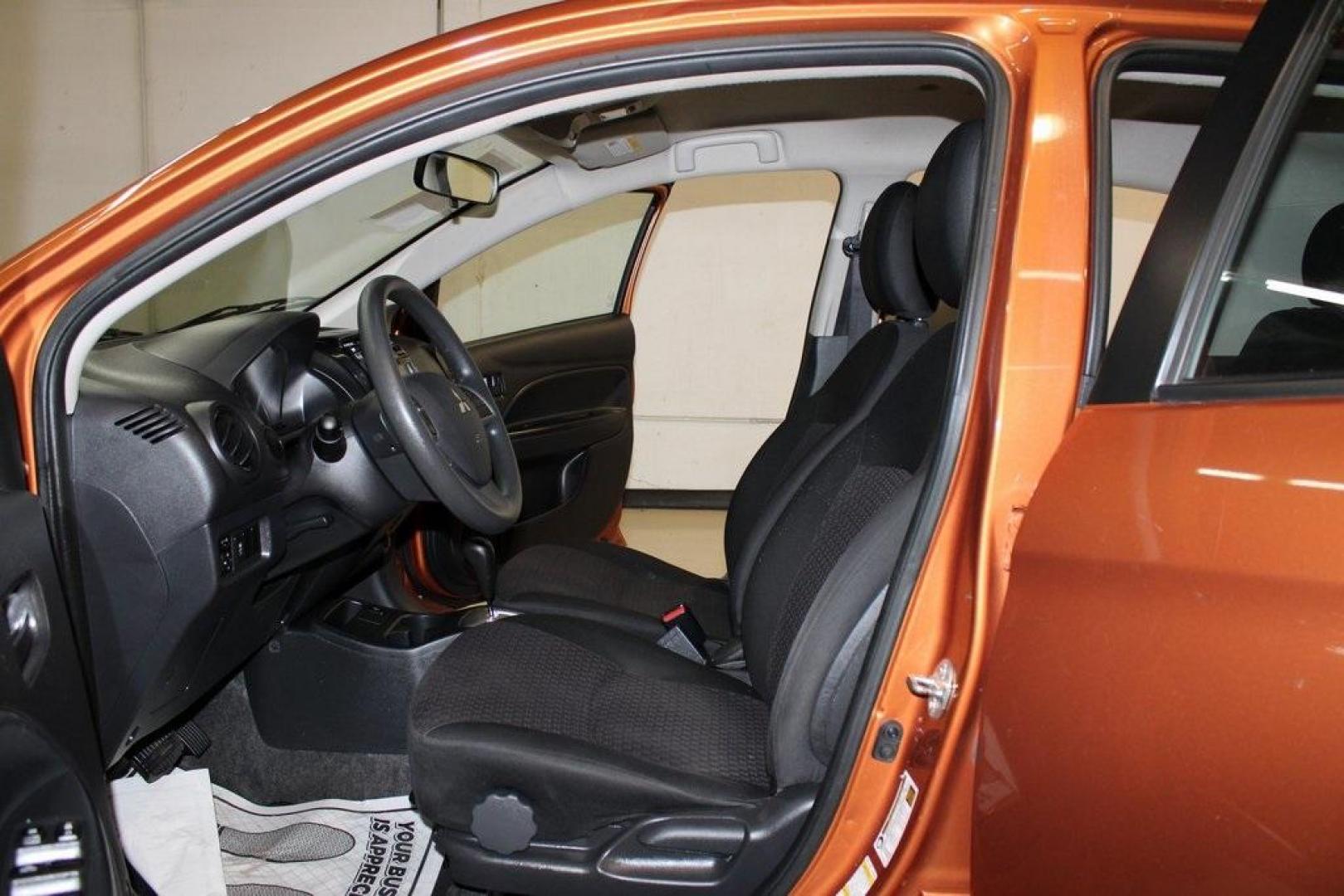 2020 Sunrise Orange Metallic /Black Mitsubishi Mirage ES (ML32A3HJ4LH) with an 1.2L 3-Cylinder DOHC MIVEC engine, CVT transmission, located at 15300 Midway Rd., Addison, TX, 75001, (972) 702-0011, 32.958321, -96.838074 - 2020 Mitsubishi Mirage ES<br>Now Available at Midway Auto Group Addison, Texas<br><br>Efficient, easy to maneuver, and surprisingly roomy, the 2020 Mitsubishi Mirage ES is a practical subcompact hatchback perfect for urban driving or budget-conscious commuters. With its impressive fuel economy and - Photo#8