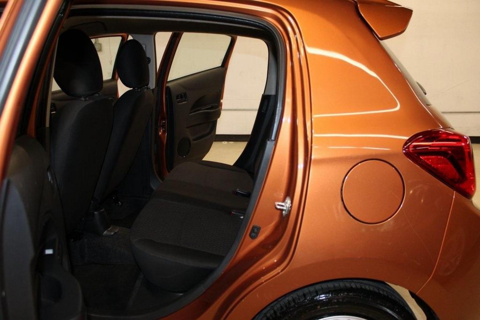 2020 Sunrise Orange Metallic /Black Mitsubishi Mirage ES (ML32A3HJ4LH) with an 1.2L 3-Cylinder DOHC MIVEC engine, CVT transmission, located at 15300 Midway Rd., Addison, TX, 75001, (972) 702-0011, 32.958321, -96.838074 - 2020 Mitsubishi Mirage ES<br>Now Available at Midway Auto Group Addison, Texas<br><br>Efficient, easy to maneuver, and surprisingly roomy, the 2020 Mitsubishi Mirage ES is a practical subcompact hatchback perfect for urban driving or budget-conscious commuters. With its impressive fuel economy and - Photo#11