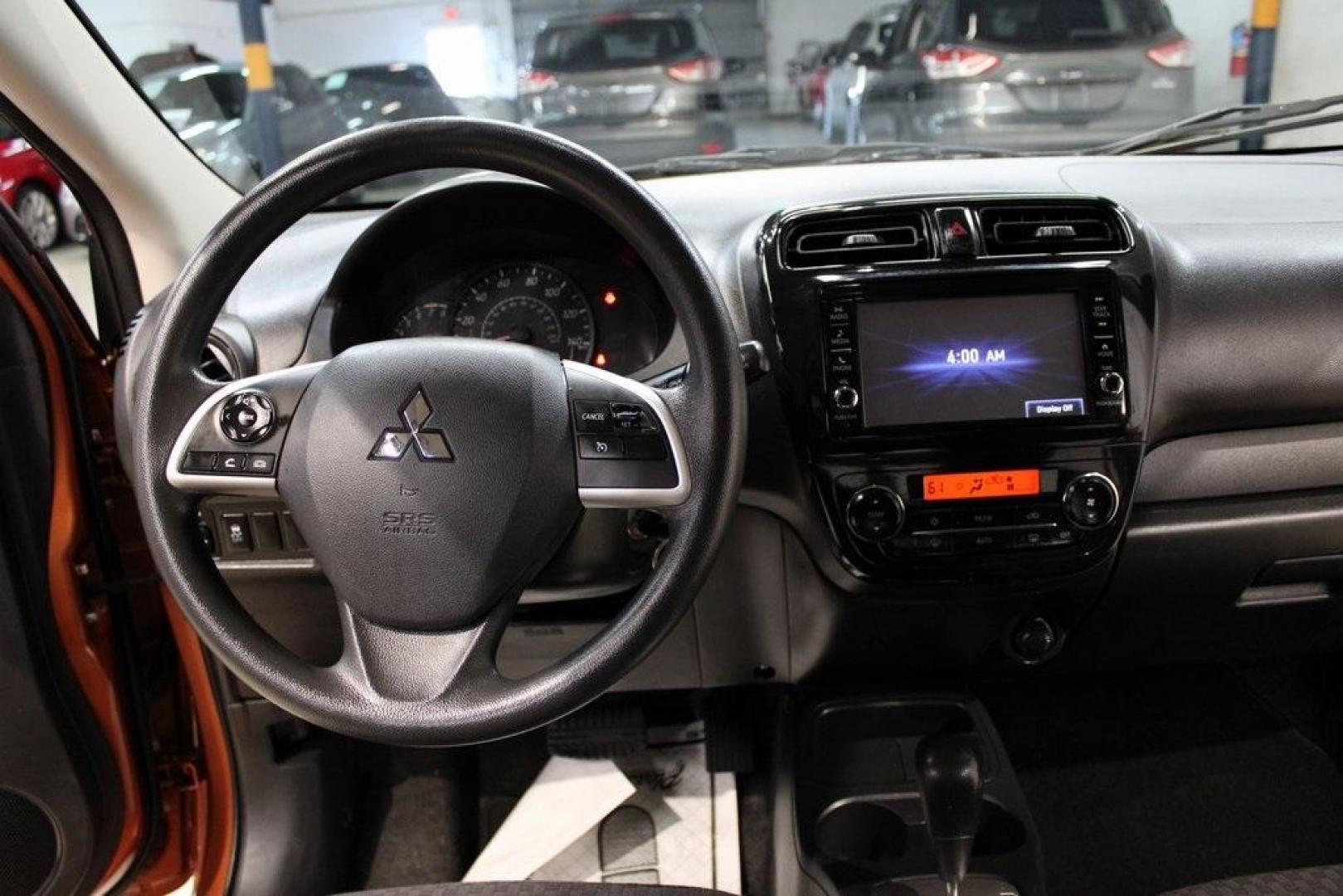 2020 Sunrise Orange Metallic /Black Mitsubishi Mirage ES (ML32A3HJ4LH) with an 1.2L 3-Cylinder DOHC MIVEC engine, CVT transmission, located at 15300 Midway Rd., Addison, TX, 75001, (972) 702-0011, 32.958321, -96.838074 - 2020 Mitsubishi Mirage ES<br>Now Available at Midway Auto Group Addison, Texas<br><br>Efficient, easy to maneuver, and surprisingly roomy, the 2020 Mitsubishi Mirage ES is a practical subcompact hatchback perfect for urban driving or budget-conscious commuters. With its impressive fuel economy and - Photo#12
