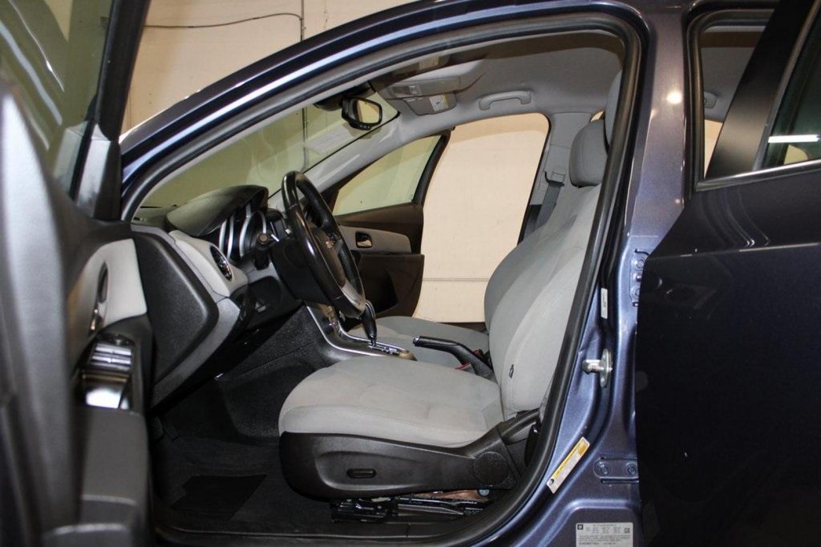 2014 Atlantis Blue Metallic /Medium Titanium Chevrolet Cruze 1LT (1G1PC5SB7E7) with an ECOTEC 1.4L I4 SMPI DOHC Turbocharged VVT engine, Automatic transmission, located at 15300 Midway Rd., Addison, TX, 75001, (972) 702-0011, 32.958321, -96.838074 - Photo#12