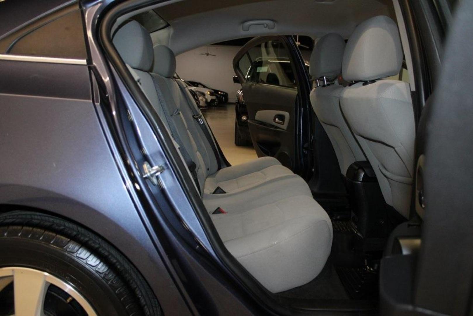 2014 Atlantis Blue Metallic /Medium Titanium Chevrolet Cruze 1LT (1G1PC5SB7E7) with an ECOTEC 1.4L I4 SMPI DOHC Turbocharged VVT engine, Automatic transmission, located at 15300 Midway Rd., Addison, TX, 75001, (972) 702-0011, 32.958321, -96.838074 - Photo#14