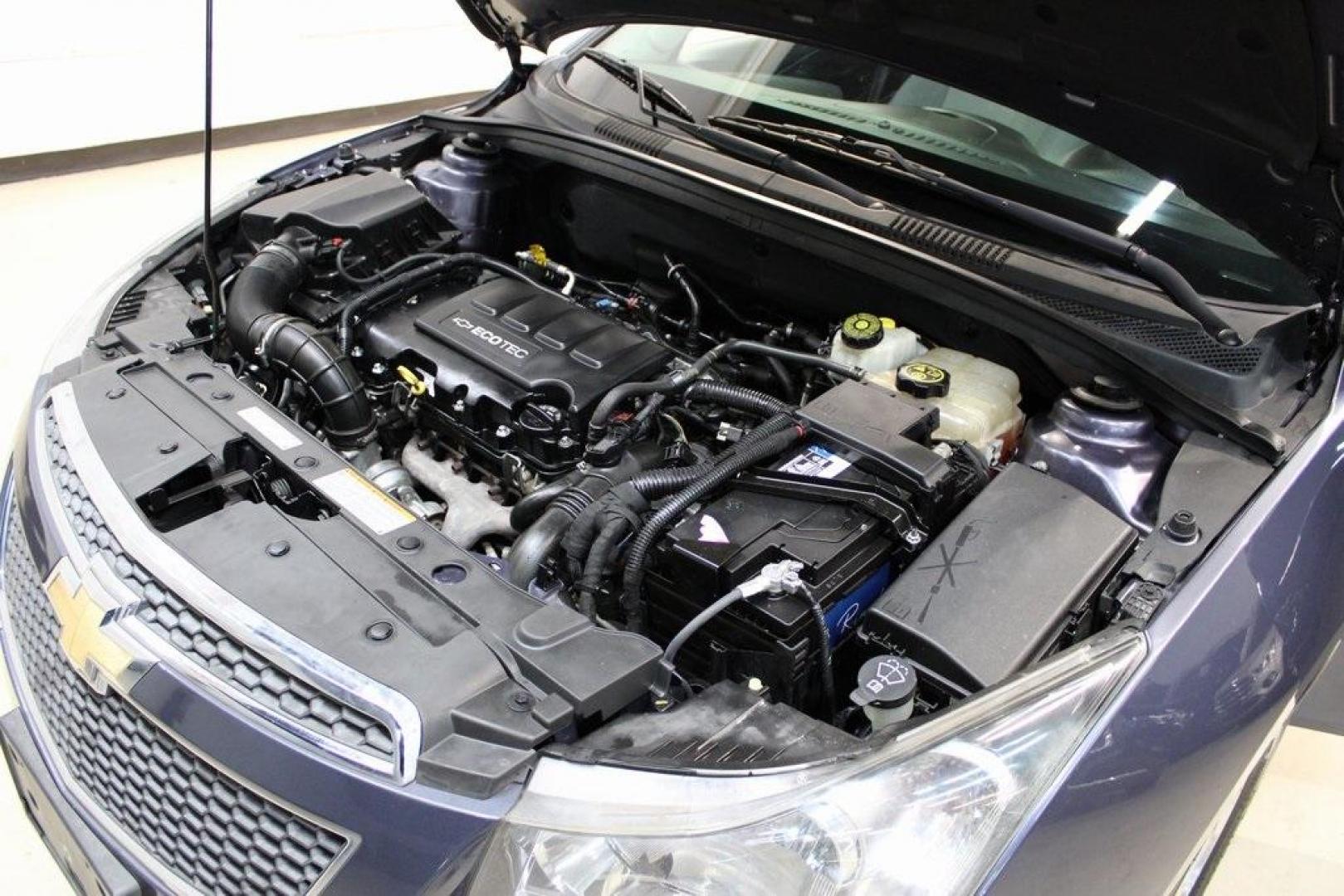 2014 Atlantis Blue Metallic /Medium Titanium Chevrolet Cruze 1LT (1G1PC5SB7E7) with an ECOTEC 1.4L I4 SMPI DOHC Turbocharged VVT engine, Automatic transmission, located at 15300 Midway Rd., Addison, TX, 75001, (972) 702-0011, 32.958321, -96.838074 - Photo#25