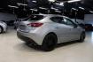 2015 Liquid Silver Metallic /Black Mazda Mazda3 i Grand Touring (3MZBM1M74FM) with an SKYACTIV-G 2.0L 4-Cylinder DOHC 16V engine, Manual transmission, located at 15300 Midway Rd., Addison, TX, 75001, (972) 702-0011, 32.958321, -96.838074 - Photo#2