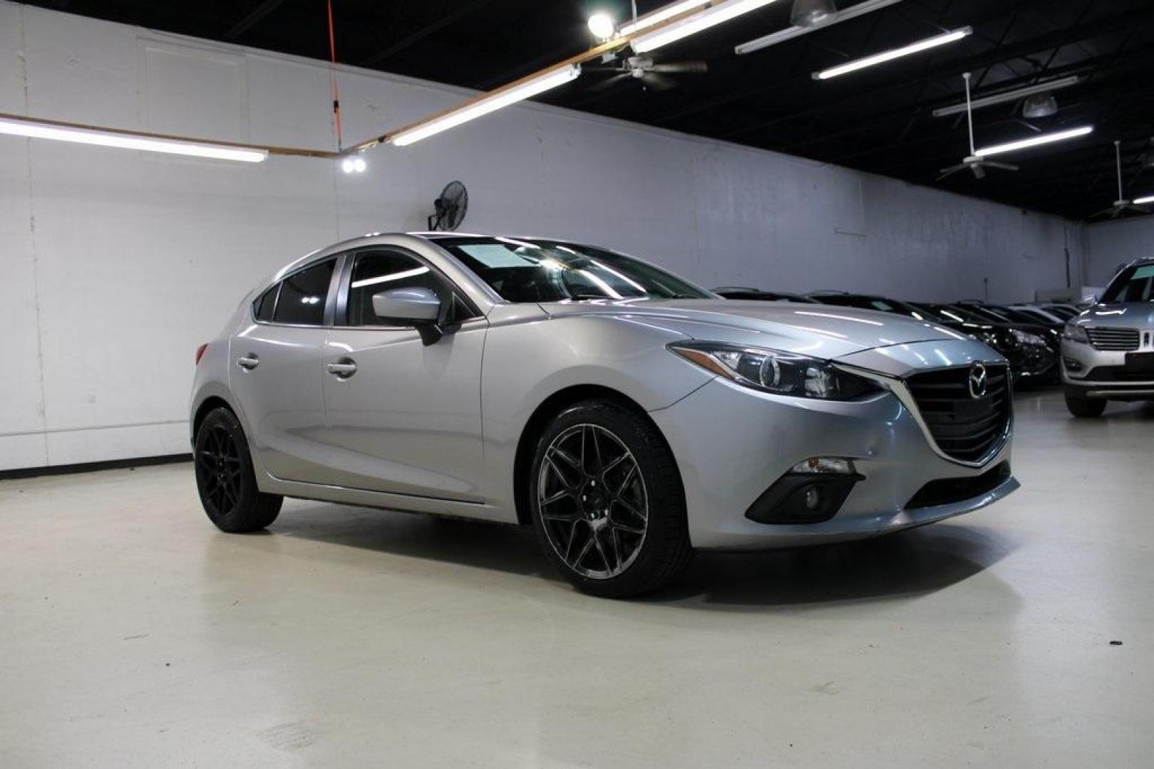 2015 Liquid Silver Metallic /Black Mazda Mazda3 i Grand Touring (3MZBM1M74FM) with an SKYACTIV-G 2.0L 4-Cylinder DOHC 16V engine, Manual transmission, located at 15300 Midway Rd., Addison, TX, 75001, (972) 702-0011, 32.958321, -96.838074 - Photo#6