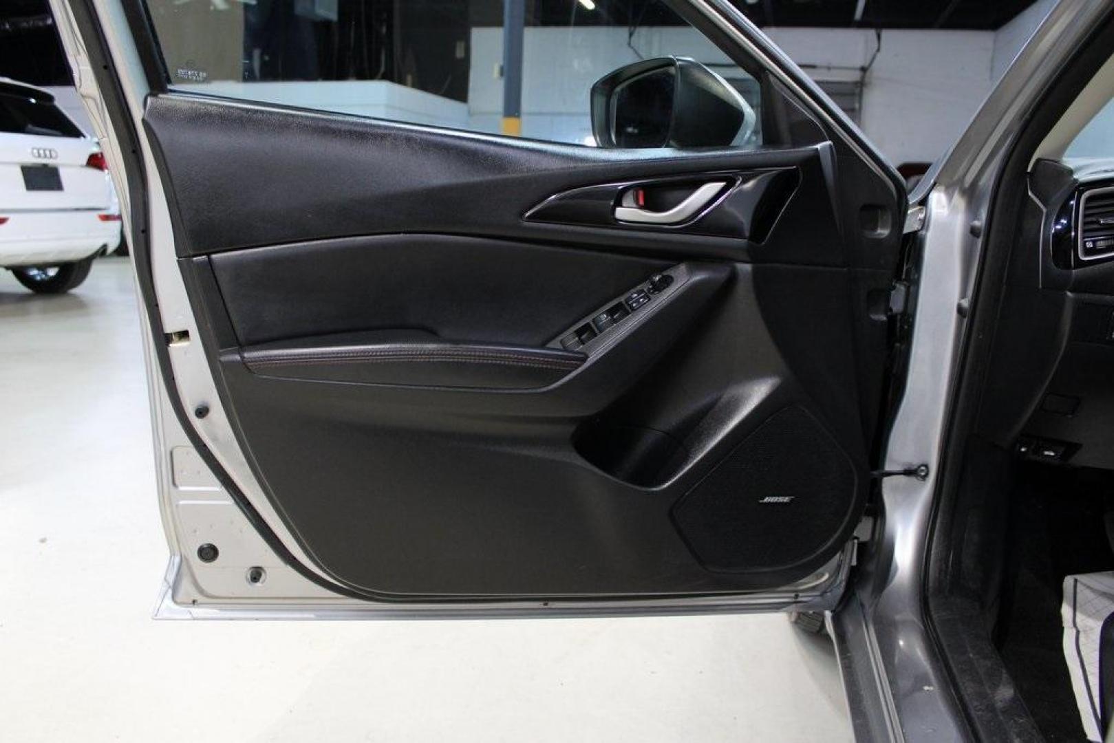 2015 Liquid Silver Metallic /Black Mazda Mazda3 i Grand Touring (3MZBM1M74FM) with an SKYACTIV-G 2.0L 4-Cylinder DOHC 16V engine, Manual transmission, located at 15300 Midway Rd., Addison, TX, 75001, (972) 702-0011, 32.958321, -96.838074 - Photo#27
