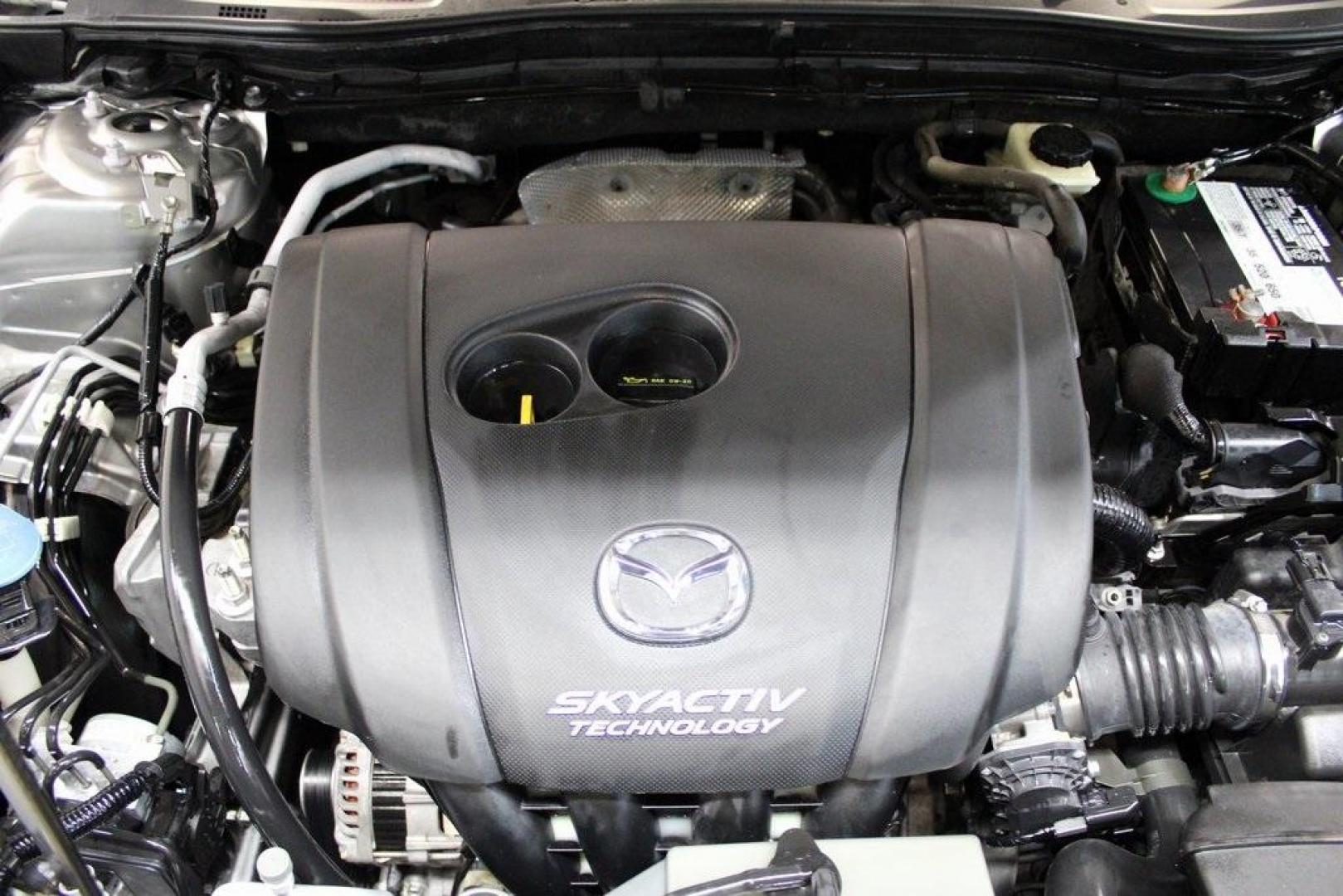 2015 Liquid Silver Metallic /Black Mazda Mazda3 i Grand Touring (3MZBM1M74FM) with an SKYACTIV-G 2.0L 4-Cylinder DOHC 16V engine, Manual transmission, located at 15300 Midway Rd., Addison, TX, 75001, (972) 702-0011, 32.958321, -96.838074 - Photo#29