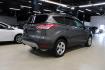 2015 Magnetic /Medium Light Stone Ford Escape SE (1FMCU0GXXFU) with an EcoBoost 1.6L I4 GTDi DOHC Turbocharged VCT engine, Automatic transmission, located at 15300 Midway Rd., Addison, TX, 75001, (972) 702-0011, 32.958321, -96.838074 - 2015 Ford Escape SE<br>Now Available at Midway Auto Group Addison, Texas<br><br>Sporty, practical, and fuel-efficient, the 2015 Ford Escape SE offers everything you want in a compact SUVresponsive handling, flexible cargo space, and modern technology. Whether you're navigating daily errands in Addi - Photo#2