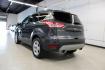 2015 Magnetic /Medium Light Stone Ford Escape SE (1FMCU0GXXFU) with an EcoBoost 1.6L I4 GTDi DOHC Turbocharged VCT engine, Automatic transmission, located at 15300 Midway Rd., Addison, TX, 75001, (972) 702-0011, 32.958321, -96.838074 - 2015 Ford Escape SE<br>Now Available at Midway Auto Group Addison, Texas<br><br>Sporty, practical, and fuel-efficient, the 2015 Ford Escape SE offers everything you want in a compact SUVresponsive handling, flexible cargo space, and modern technology. Whether you're navigating daily errands in Addi - Photo#3