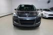 2015 Magnetic /Medium Light Stone Ford Escape SE (1FMCU0GXXFU) with an EcoBoost 1.6L I4 GTDi DOHC Turbocharged VCT engine, Automatic transmission, located at 15300 Midway Rd., Addison, TX, 75001, (972) 702-0011, 32.958321, -96.838074 - 2015 Ford Escape SE<br>Now Available at Midway Auto Group Addison, Texas<br><br>Sporty, practical, and fuel-efficient, the 2015 Ford Escape SE offers everything you want in a compact SUVresponsive handling, flexible cargo space, and modern technology. Whether you're navigating daily errands in Addi - Photo#5