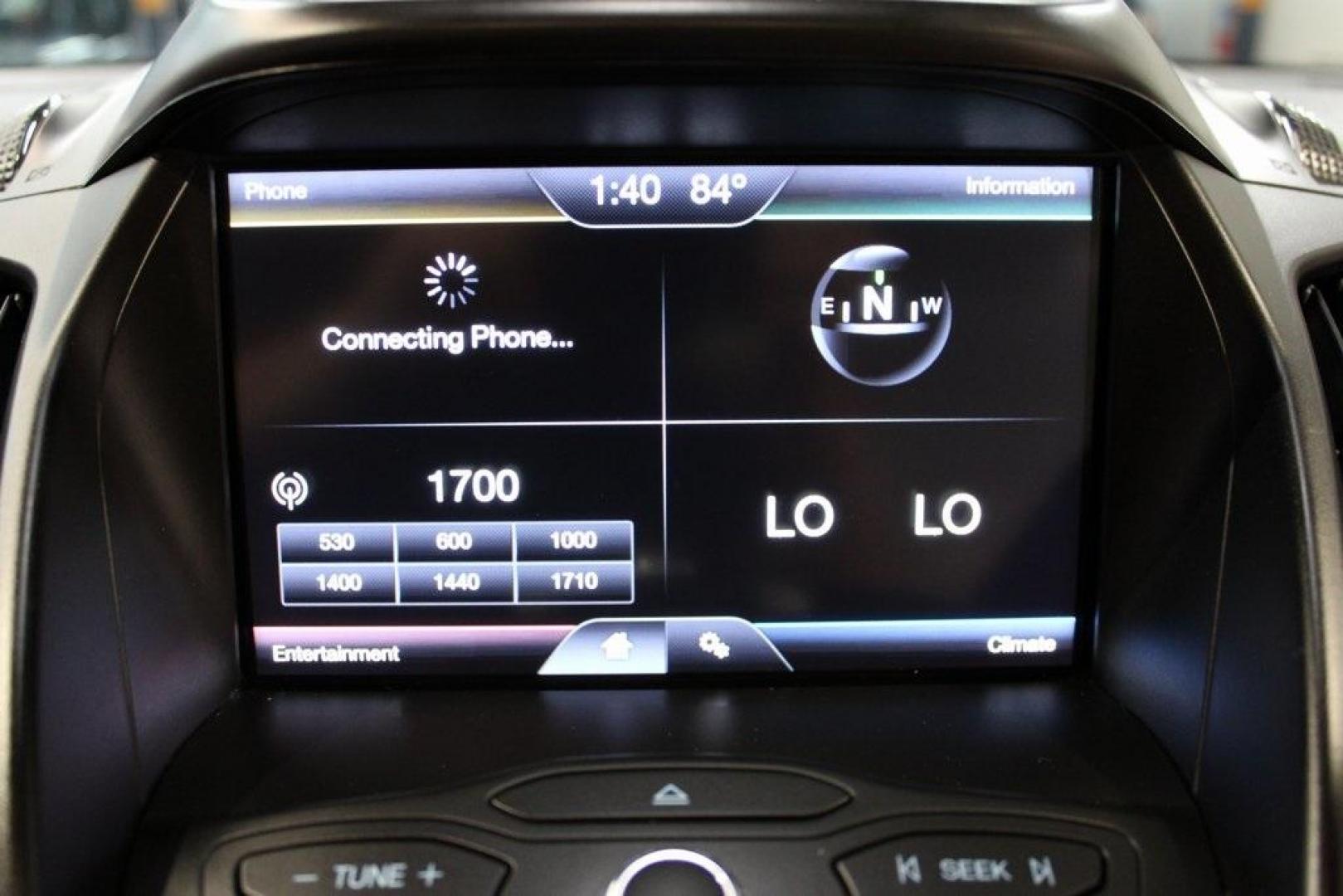 2015 Magnetic /Medium Light Stone Ford Escape SE (1FMCU0GXXFU) with an EcoBoost 1.6L I4 GTDi DOHC Turbocharged VCT engine, Automatic transmission, located at 15300 Midway Rd., Addison, TX, 75001, (972) 702-0011, 32.958321, -96.838074 - 2015 Ford Escape SE<br>Now Available at Midway Auto Group Addison, Texas<br><br>Sporty, practical, and fuel-efficient, the 2015 Ford Escape SE offers everything you want in a compact SUVresponsive handling, flexible cargo space, and modern technology. Whether you're navigating daily errands in Addi - Photo#19