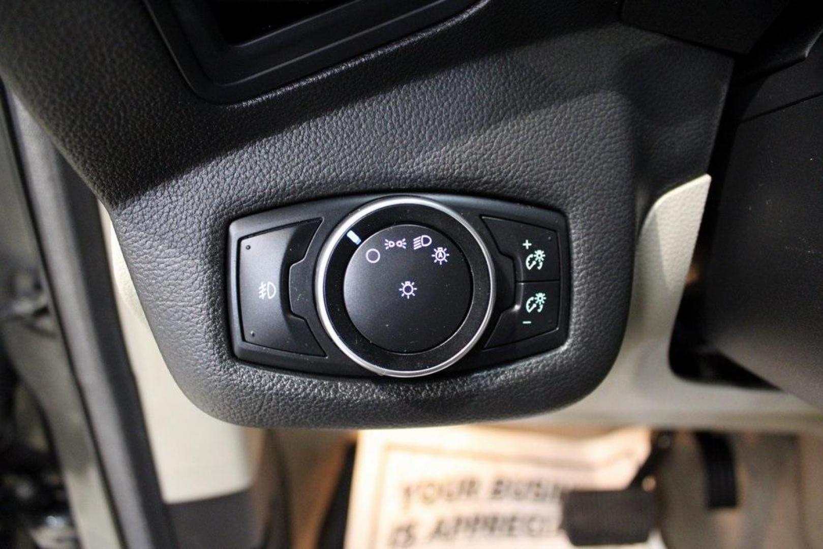 2015 Magnetic /Medium Light Stone Ford Escape SE (1FMCU0GXXFU) with an EcoBoost 1.6L I4 GTDi DOHC Turbocharged VCT engine, Automatic transmission, located at 15300 Midway Rd., Addison, TX, 75001, (972) 702-0011, 32.958321, -96.838074 - 2015 Ford Escape SE<br>Now Available at Midway Auto Group Addison, Texas<br><br>Sporty, practical, and fuel-efficient, the 2015 Ford Escape SE offers everything you want in a compact SUVresponsive handling, flexible cargo space, and modern technology. Whether you're navigating daily errands in Addi - Photo#26