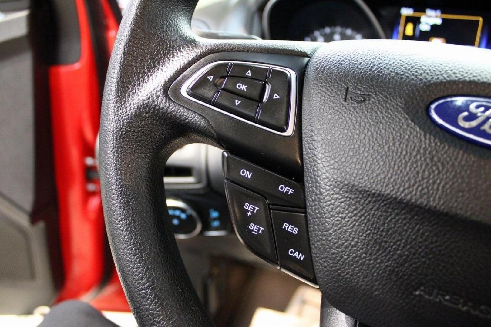 2017 Race Red /Charcoal Black Ford Focus SE (1FADP3F23HL) with an 2.0L 4-Cylinder DGI Flex Fuel Turbocharged DOHC engine, Automatic transmission, located at 15300 Midway Rd., Addison, TX, 75001, (972) 702-0011, 32.958321, -96.838074 - ''2017 Ford Focus SE<br>Now Available at Midway Auto Group Addison, Texas<br><br>Affordable, efficient, and well-equipped, the 2017 Ford Focus SE is a smart choice for anyone looking for a reliable compact sedan with style and substance. Whether you're commuting through Addison or cruising the open - Photo#24