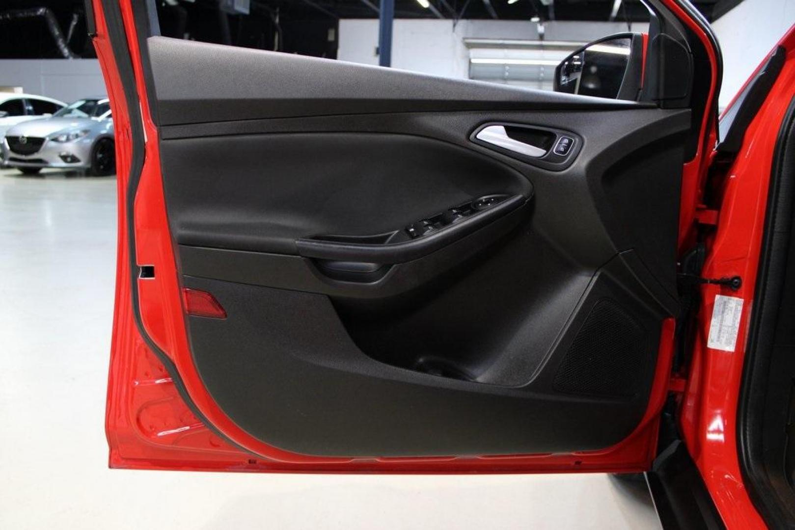 2017 Race Red /Charcoal Black Ford Focus SE (1FADP3F23HL) with an 2.0L 4-Cylinder DGI Flex Fuel Turbocharged DOHC engine, Automatic transmission, located at 15300 Midway Rd., Addison, TX, 75001, (972) 702-0011, 32.958321, -96.838074 - ''2017 Ford Focus SE<br>Now Available at Midway Auto Group Addison, Texas<br><br>Affordable, efficient, and well-equipped, the 2017 Ford Focus SE is a smart choice for anyone looking for a reliable compact sedan with style and substance. Whether you're commuting through Addison or cruising the open - Photo#25