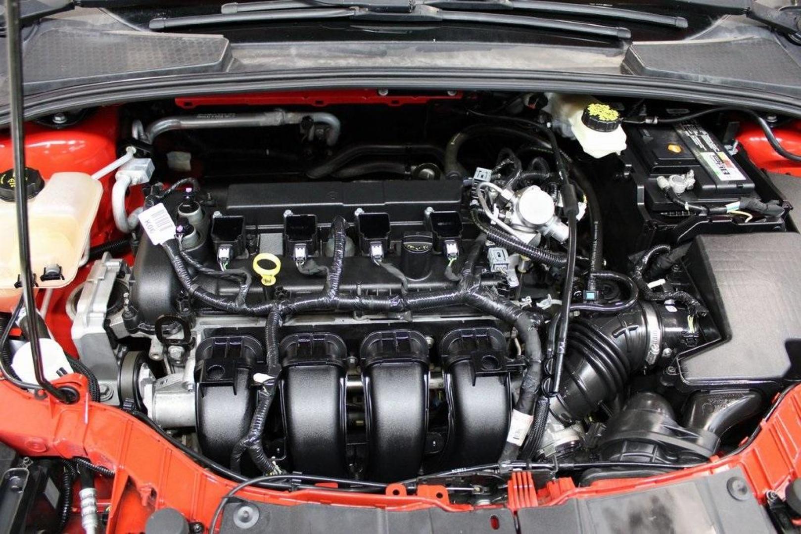 2017 Race Red /Charcoal Black Ford Focus SE (1FADP3F23HL) with an 2.0L 4-Cylinder DGI Flex Fuel Turbocharged DOHC engine, Automatic transmission, located at 15300 Midway Rd., Addison, TX, 75001, (972) 702-0011, 32.958321, -96.838074 - ''2017 Ford Focus SE<br>Now Available at Midway Auto Group Addison, Texas<br><br>Affordable, efficient, and well-equipped, the 2017 Ford Focus SE is a smart choice for anyone looking for a reliable compact sedan with style and substance. Whether you're commuting through Addison or cruising the open - Photo#27