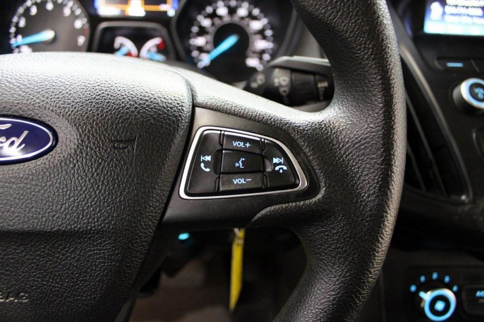 2018 Oxford White /Charcoal Black Ford Focus SE (1FADP3F29JL) with an 2.0L I4 DGI Ti-VCT engine, Automatic transmission, located at 15300 Midway Rd., Addison, TX, 75001, (972) 702-0011, 32.958321, -96.838074 - 2018 Ford Focus SE<br>Now Available at Midway Auto Group Addison, Texas<br><br>Compact, efficient, and packed with value, the 2018 Ford Focus SE offers a smart balance of fuel economy, comfort, and modern features. Whether you're commuting through Addison or navigating city streets across the DFW m - Photo#21