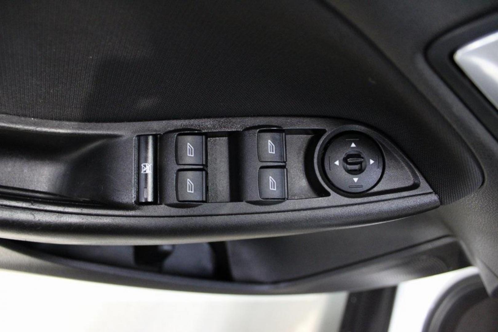 2018 Oxford White /Charcoal Black Ford Focus SE (1FADP3F29JL) with an 2.0L I4 DGI Ti-VCT engine, Automatic transmission, located at 15300 Midway Rd., Addison, TX, 75001, (972) 702-0011, 32.958321, -96.838074 - 2018 Ford Focus SE<br>Now Available at Midway Auto Group Addison, Texas<br><br>Compact, efficient, and packed with value, the 2018 Ford Focus SE offers a smart balance of fuel economy, comfort, and modern features. Whether you're commuting through Addison or navigating city streets across the DFW m - Photo#24