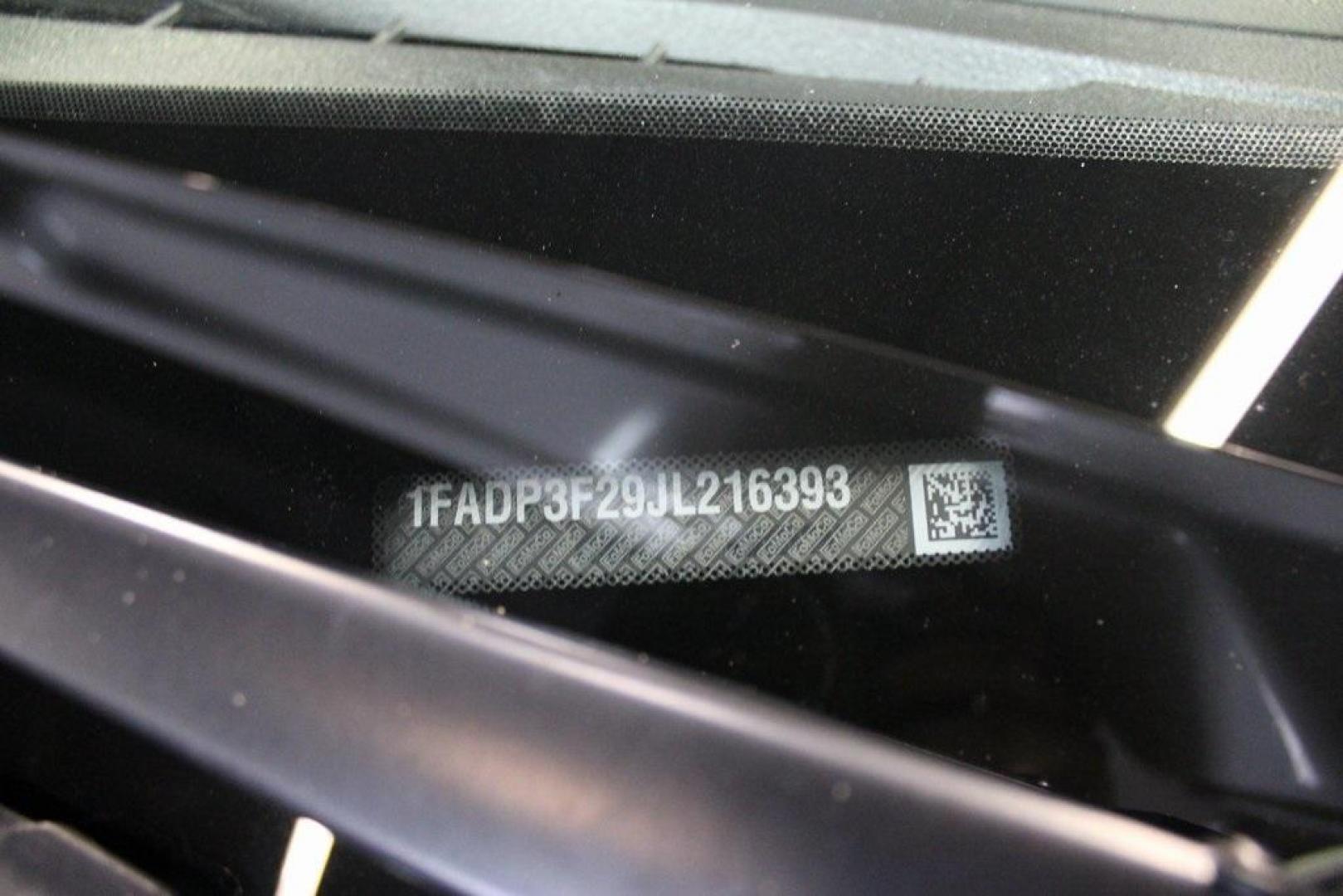 2018 Oxford White /Charcoal Black Ford Focus SE (1FADP3F29JL) with an 2.0L I4 DGI Ti-VCT engine, Automatic transmission, located at 15300 Midway Rd., Addison, TX, 75001, (972) 702-0011, 32.958321, -96.838074 - 2018 Ford Focus SE<br>Now Available at Midway Auto Group Addison, Texas<br><br>Compact, efficient, and packed with value, the 2018 Ford Focus SE offers a smart balance of fuel economy, comfort, and modern features. Whether you're commuting through Addison or navigating city streets across the DFW m - Photo#27