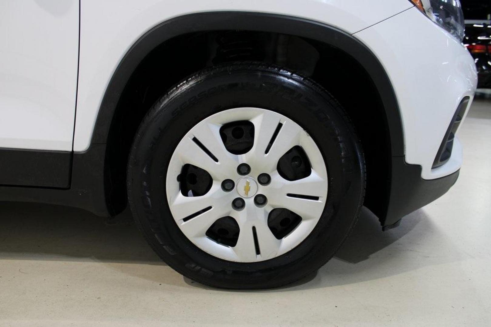 2018 Summit White /Black Chevrolet Trax LS (3GNCJKSB3JL) with an ECOTEC 1.4L I4 SMPI DOHC Turbocharged VVT engine, Automatic transmission, located at 15300 Midway Rd., Addison, TX, 75001, (972) 702-0011, 32.958321, -96.838074 - Photo#11