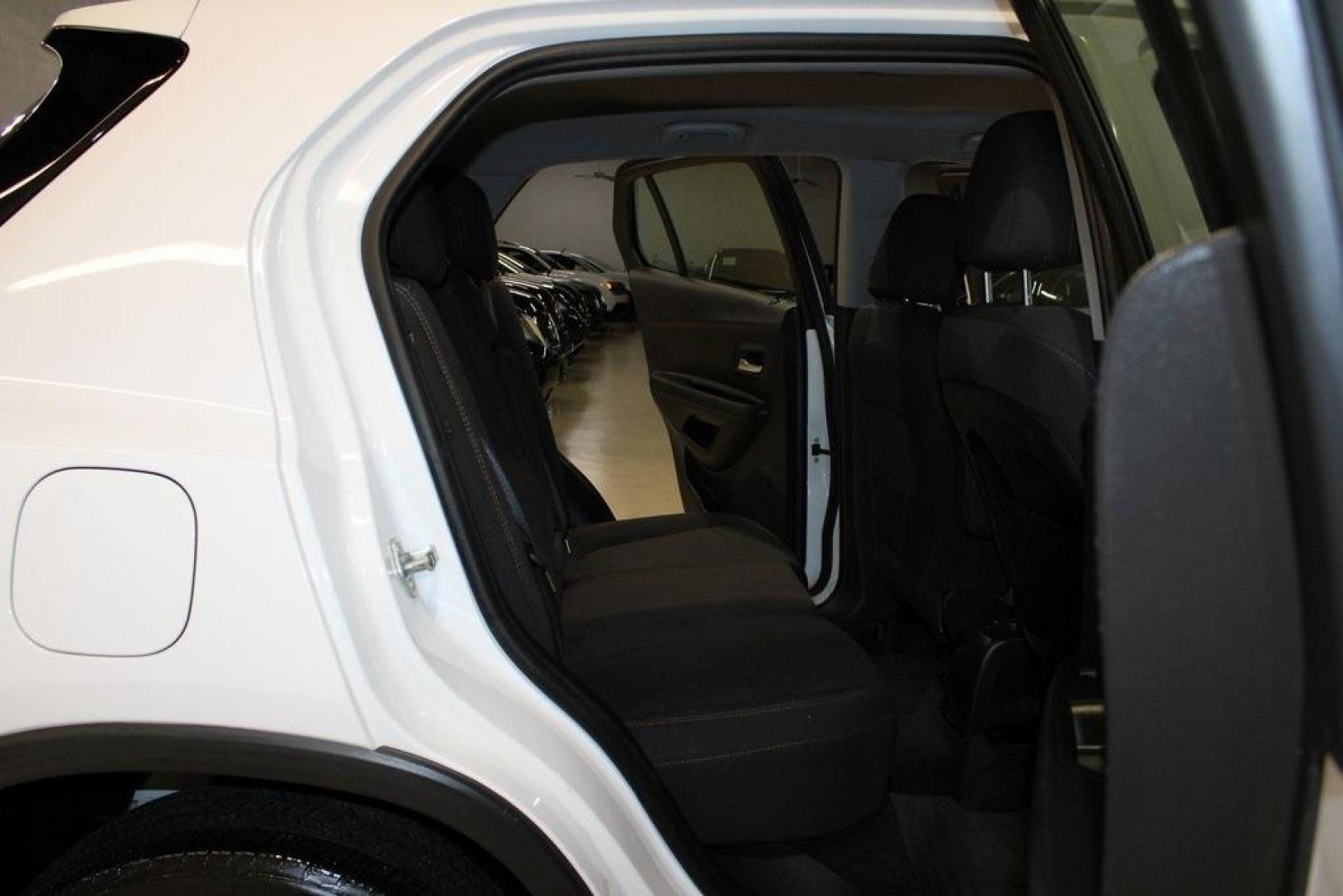 2018 Summit White /Black Chevrolet Trax LS (3GNCJKSB3JL) with an ECOTEC 1.4L I4 SMPI DOHC Turbocharged VVT engine, Automatic transmission, located at 15300 Midway Rd., Addison, TX, 75001, (972) 702-0011, 32.958321, -96.838074 - Photo#14