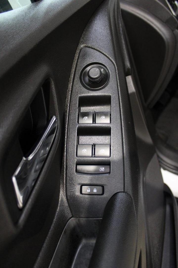 2018 Summit White /Black Chevrolet Trax LS (3GNCJKSB3JL) with an ECOTEC 1.4L I4 SMPI DOHC Turbocharged VVT engine, Automatic transmission, located at 15300 Midway Rd., Addison, TX, 75001, (972) 702-0011, 32.958321, -96.838074 - Photo#24